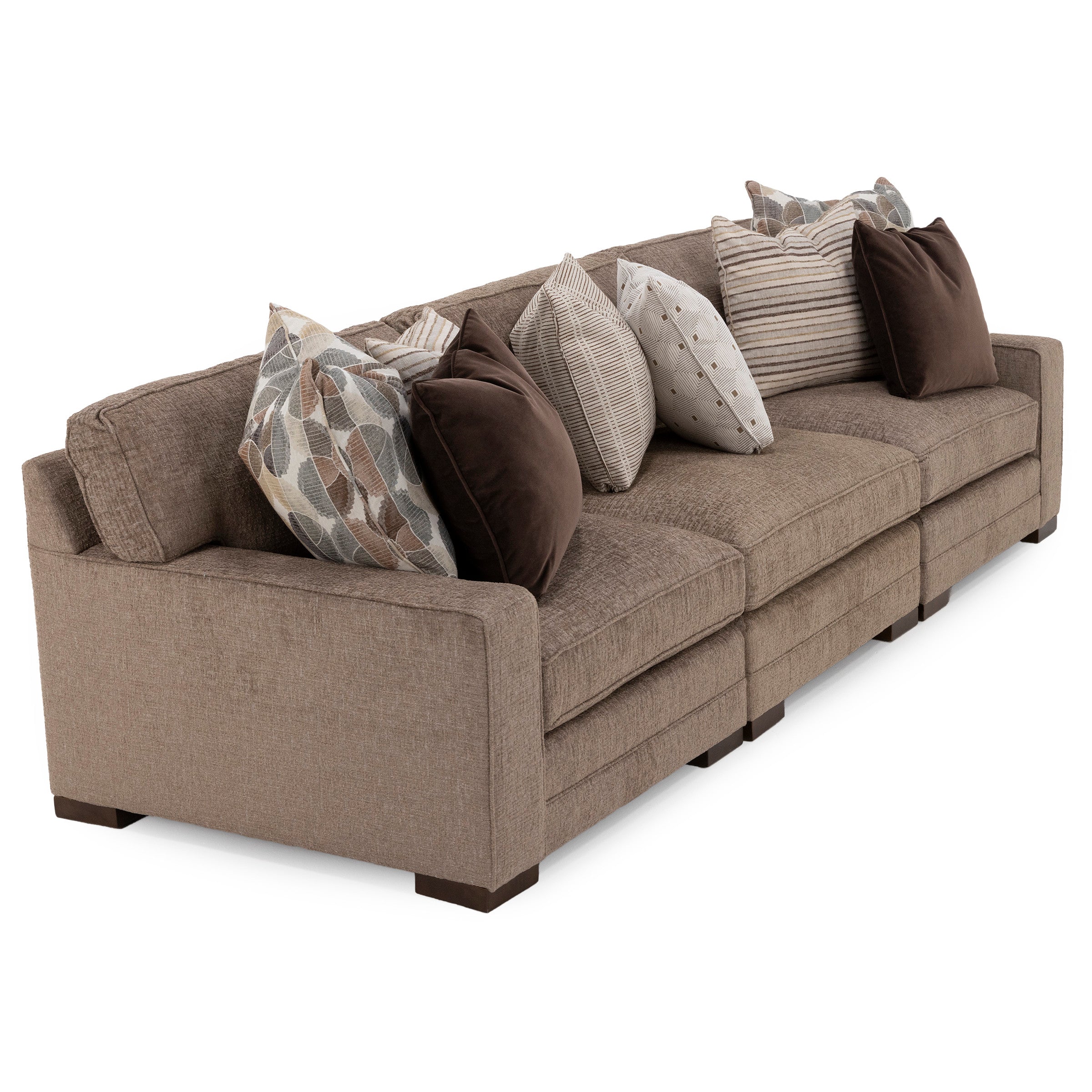 Modern brown fabric sofa with multiple decorative throw pillows.