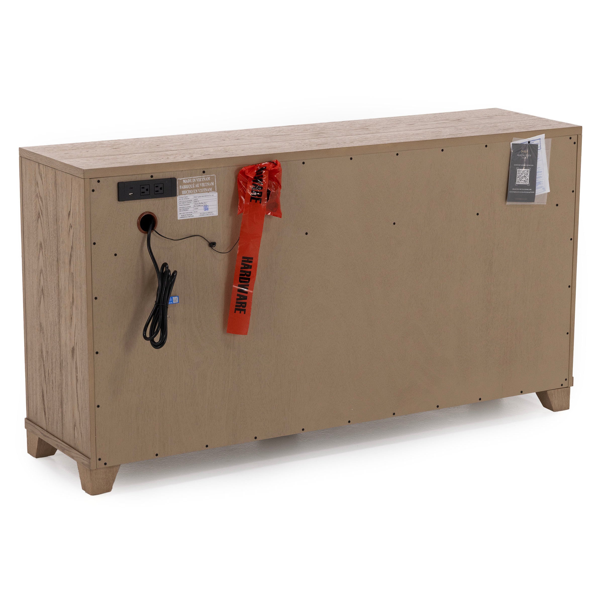 Back view of a light wood cabinet with power outlets and hardware bag attached.