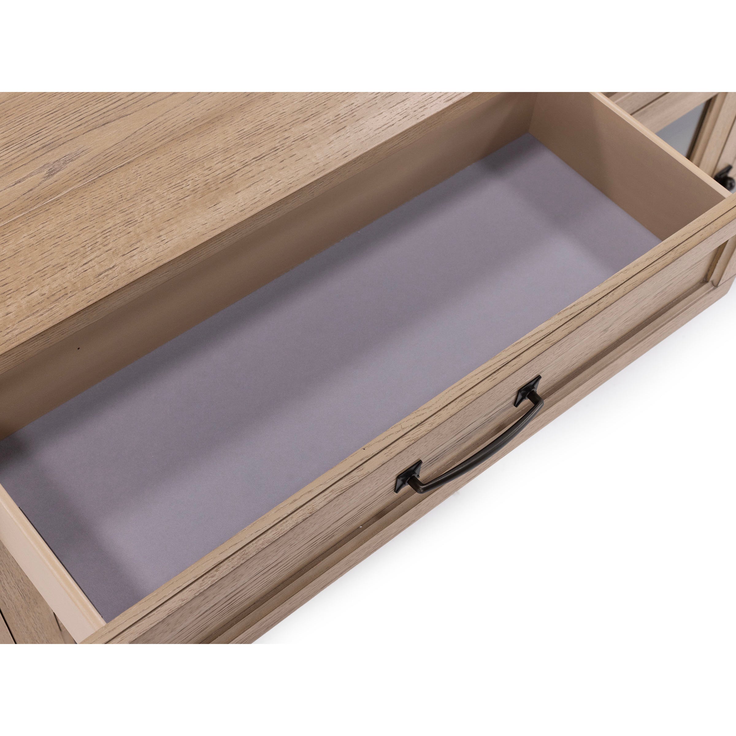 Open wooden drawer with metal handle, empty interior.