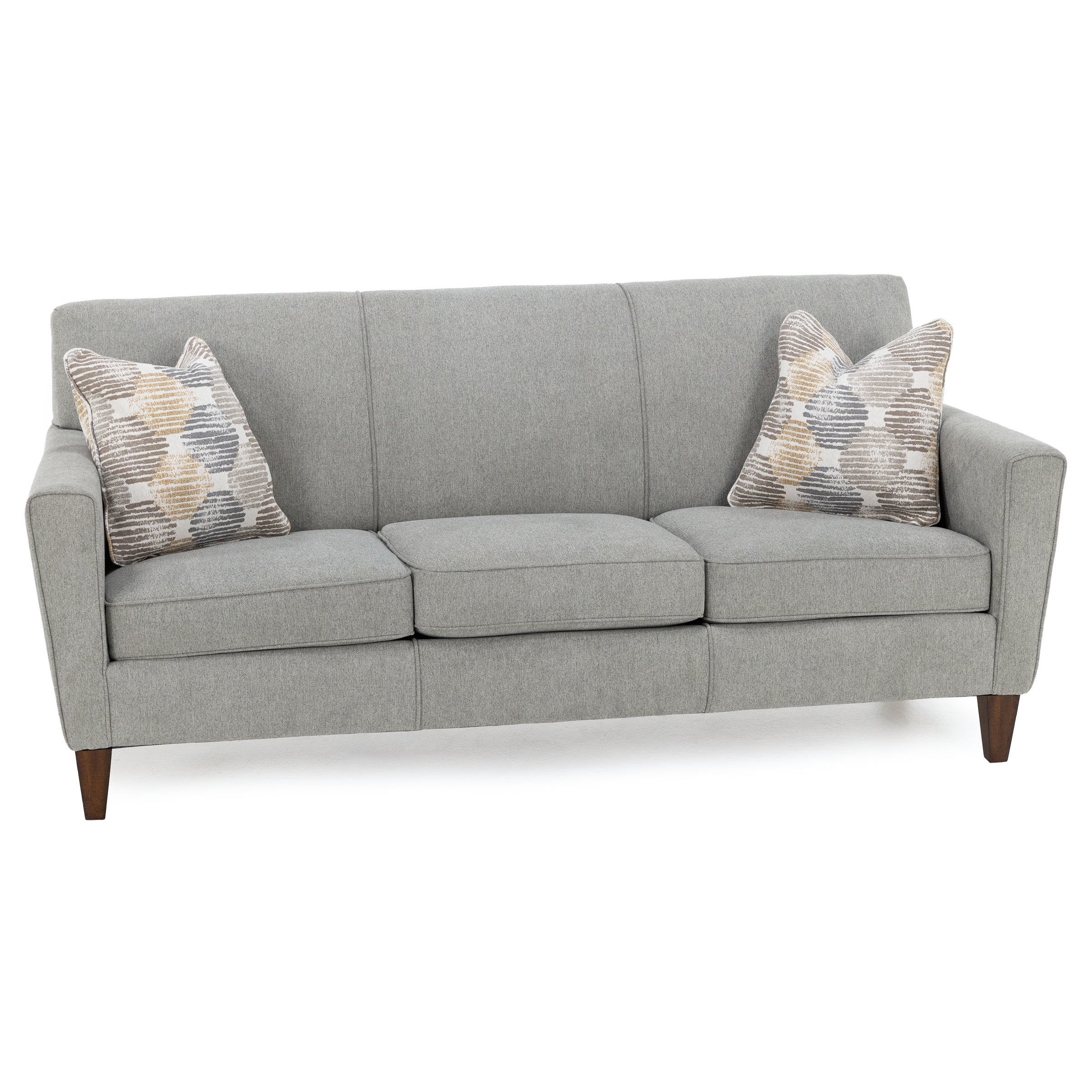 Gray fabric sofa with two patterned accent pillows.