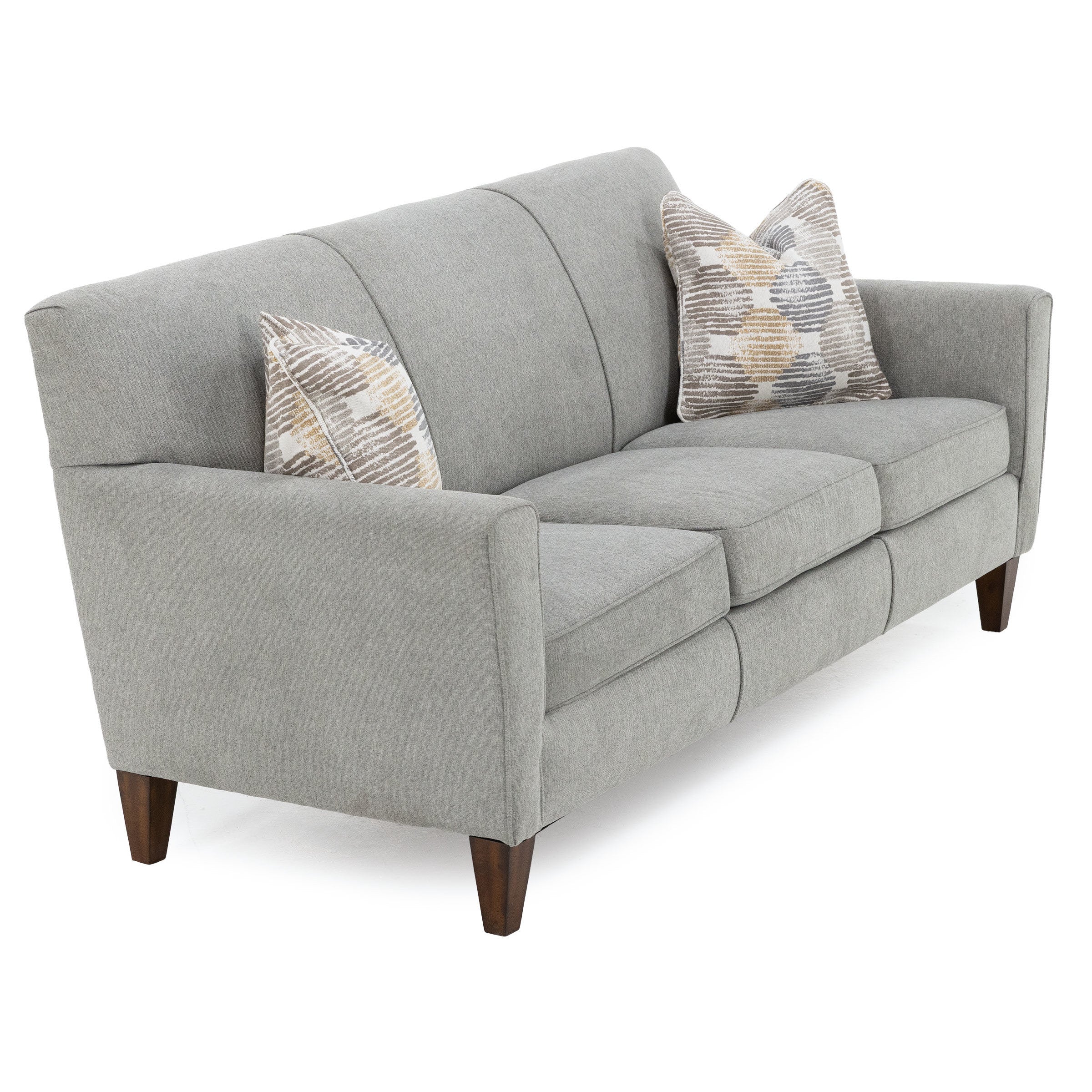 Modern gray three-seat sofa with patterned accent pillows.