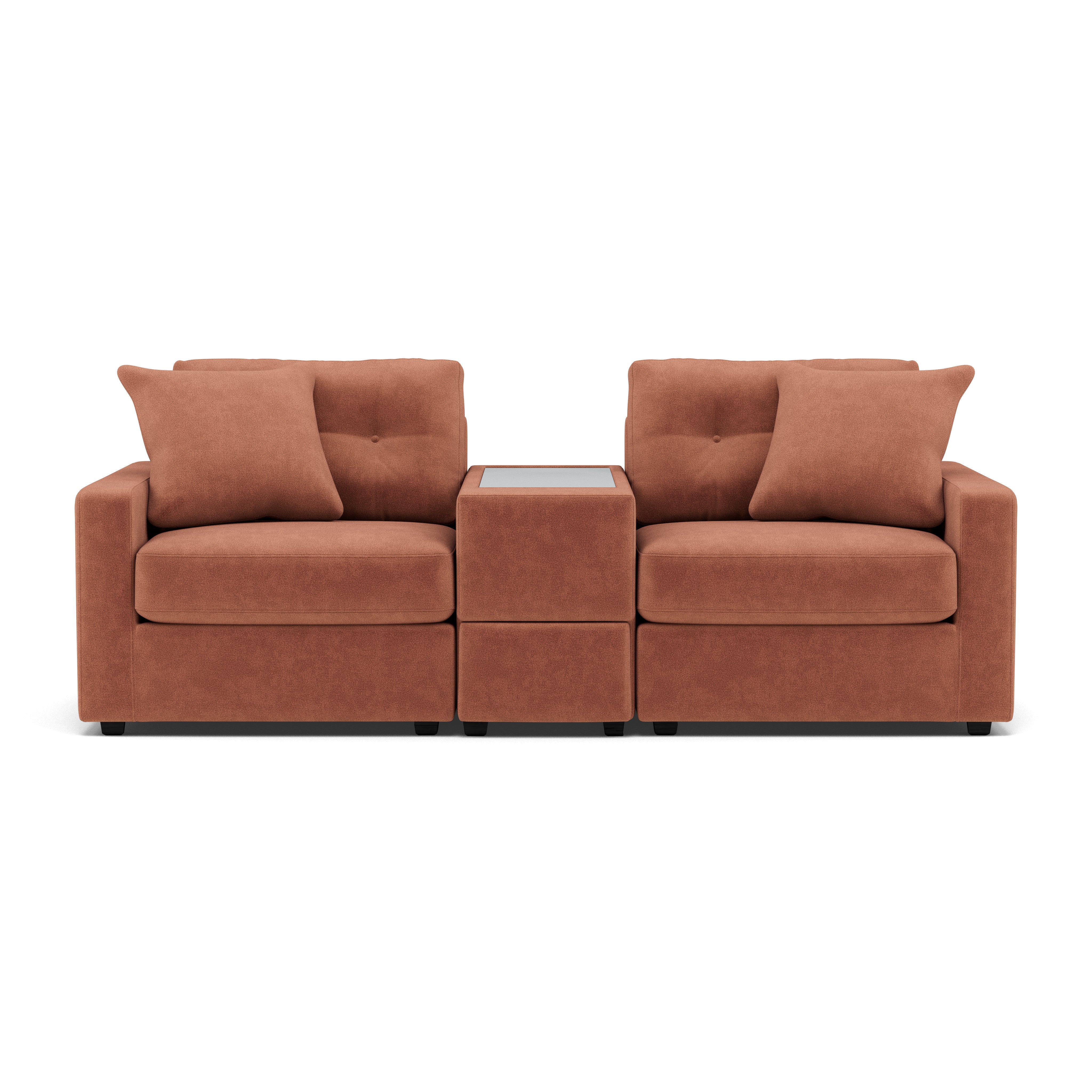 Modern two-seat sofa with center console and pillows, upholstered in rust-colored fabric.
