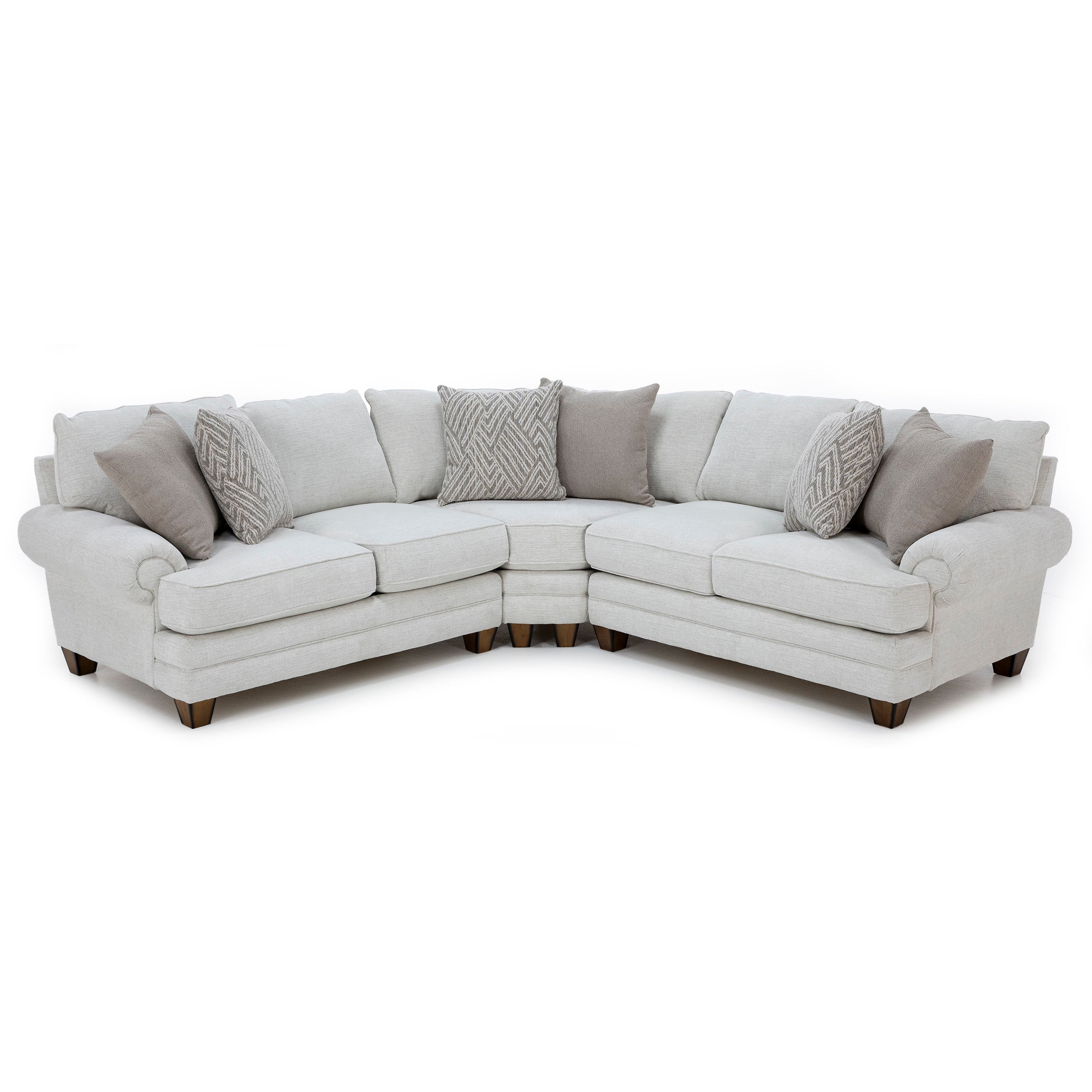 Light gray sectional sofa with plush cushions and decorative pillows.