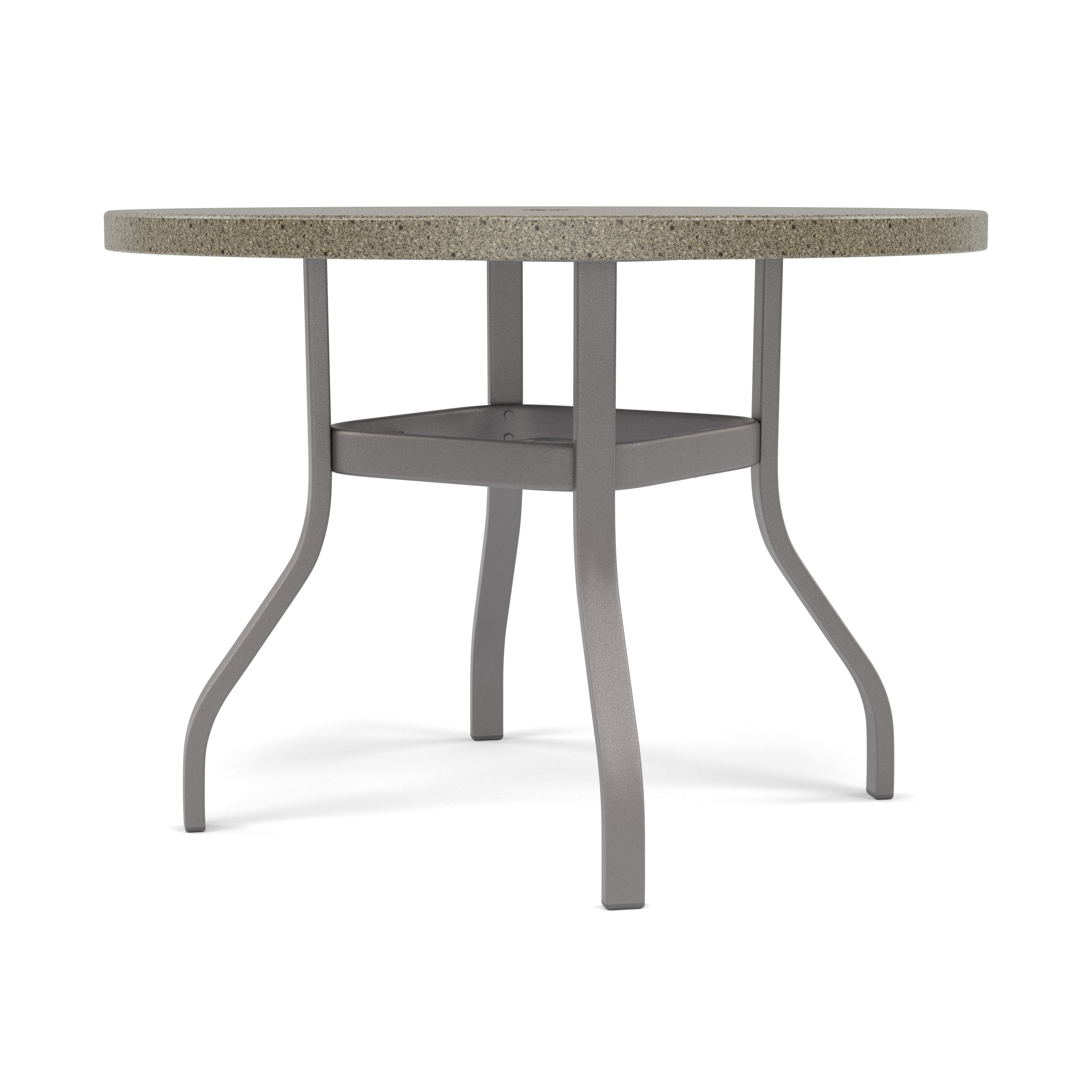 Round outdoor table with a speckled stone top and metal legs.