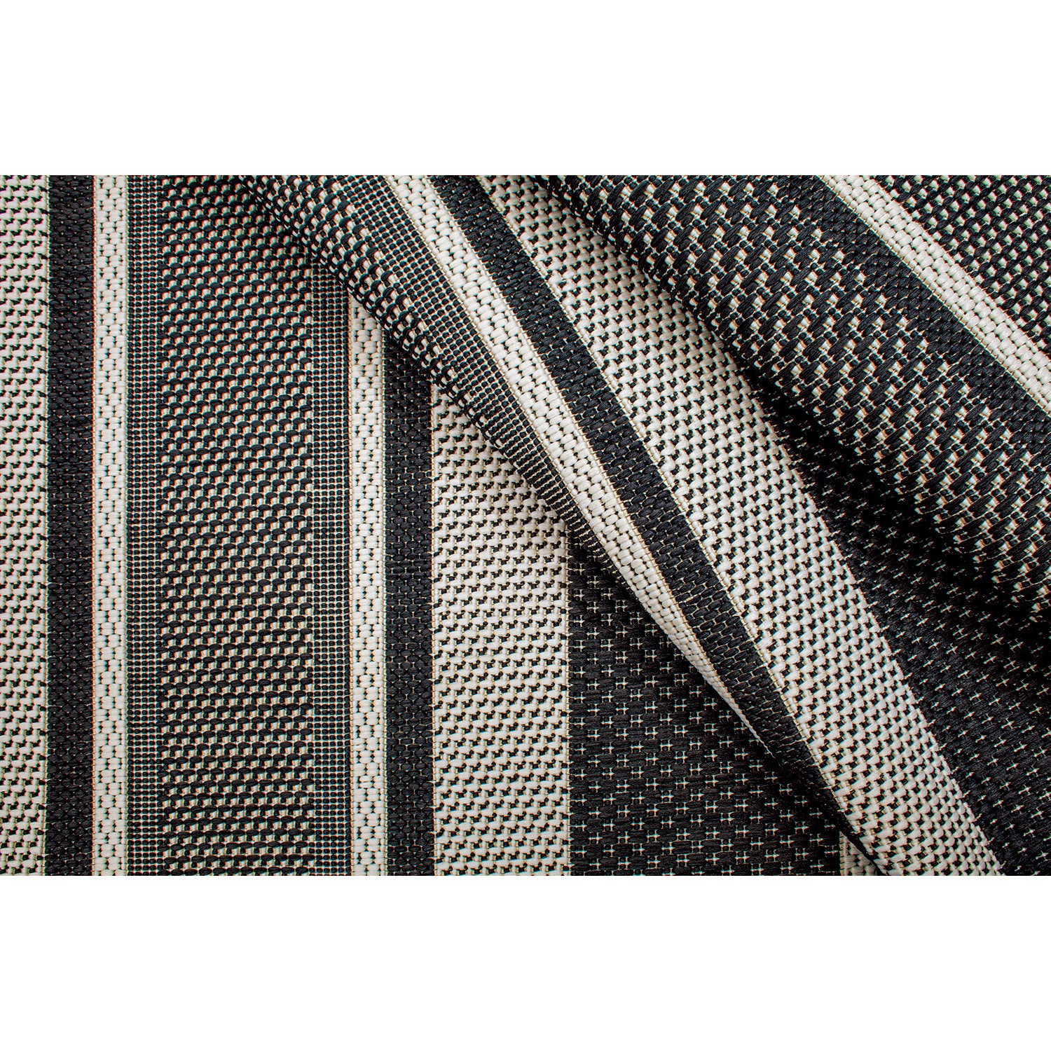 Black and white fabric with woven geometric stripes and small square patterns.