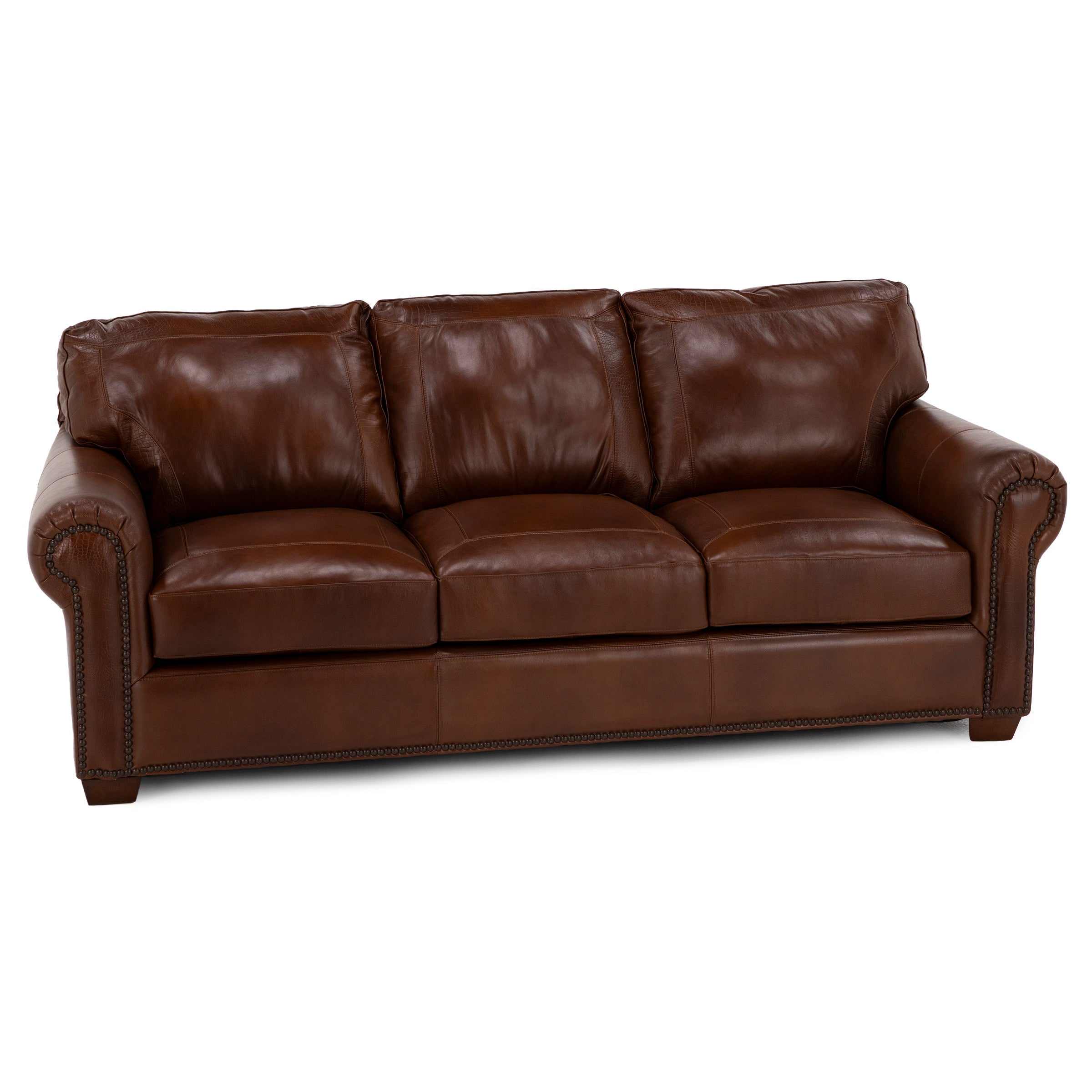 Brown leather sofa with rolled arms and nailhead trim