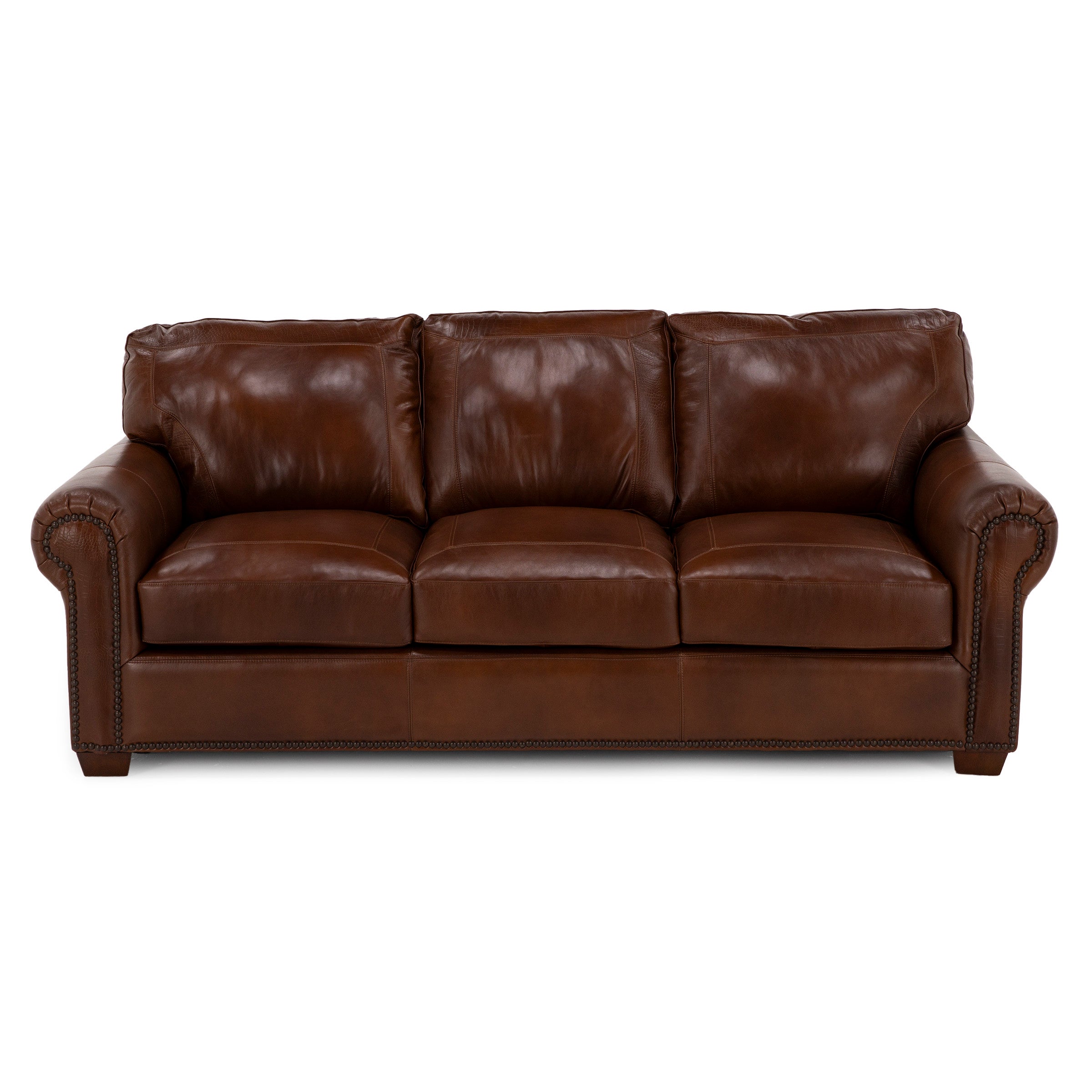 Brown leather sofa with rolled arms and nailhead trim detailing