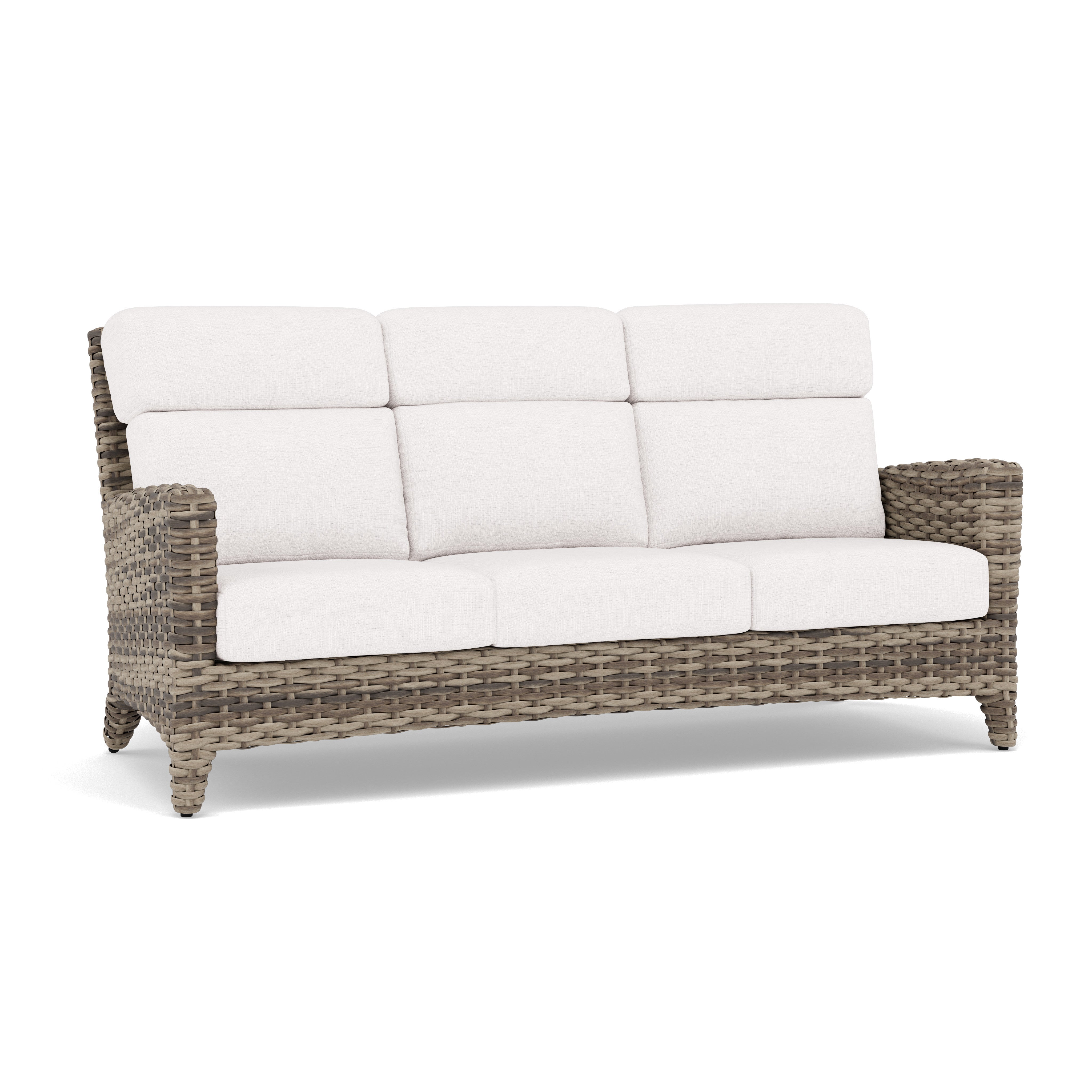 Three-seat outdoor wicker sofa with light beige cushions.