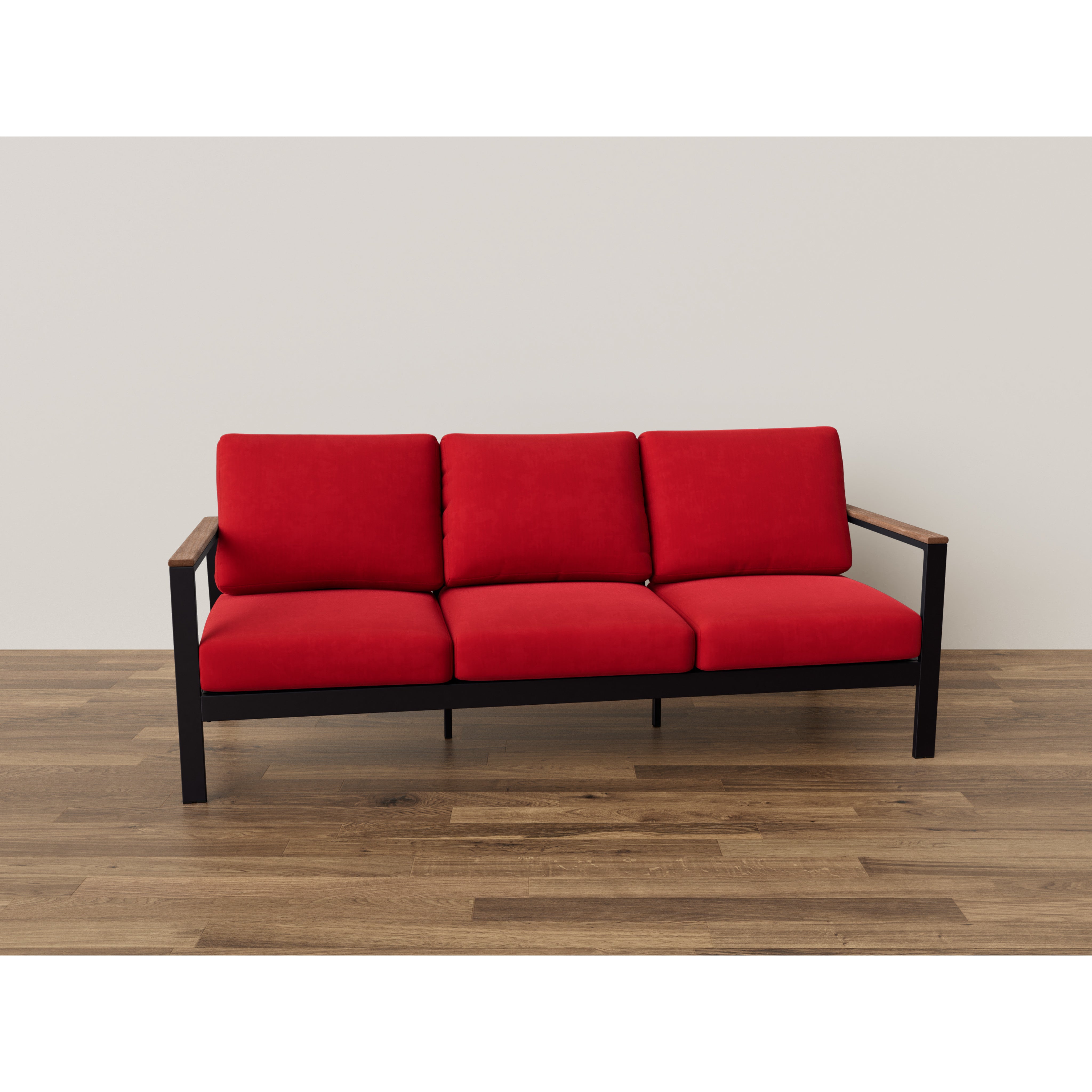 Modern red three-seat sofa with black metal frame and wooden armrests on wood floor.