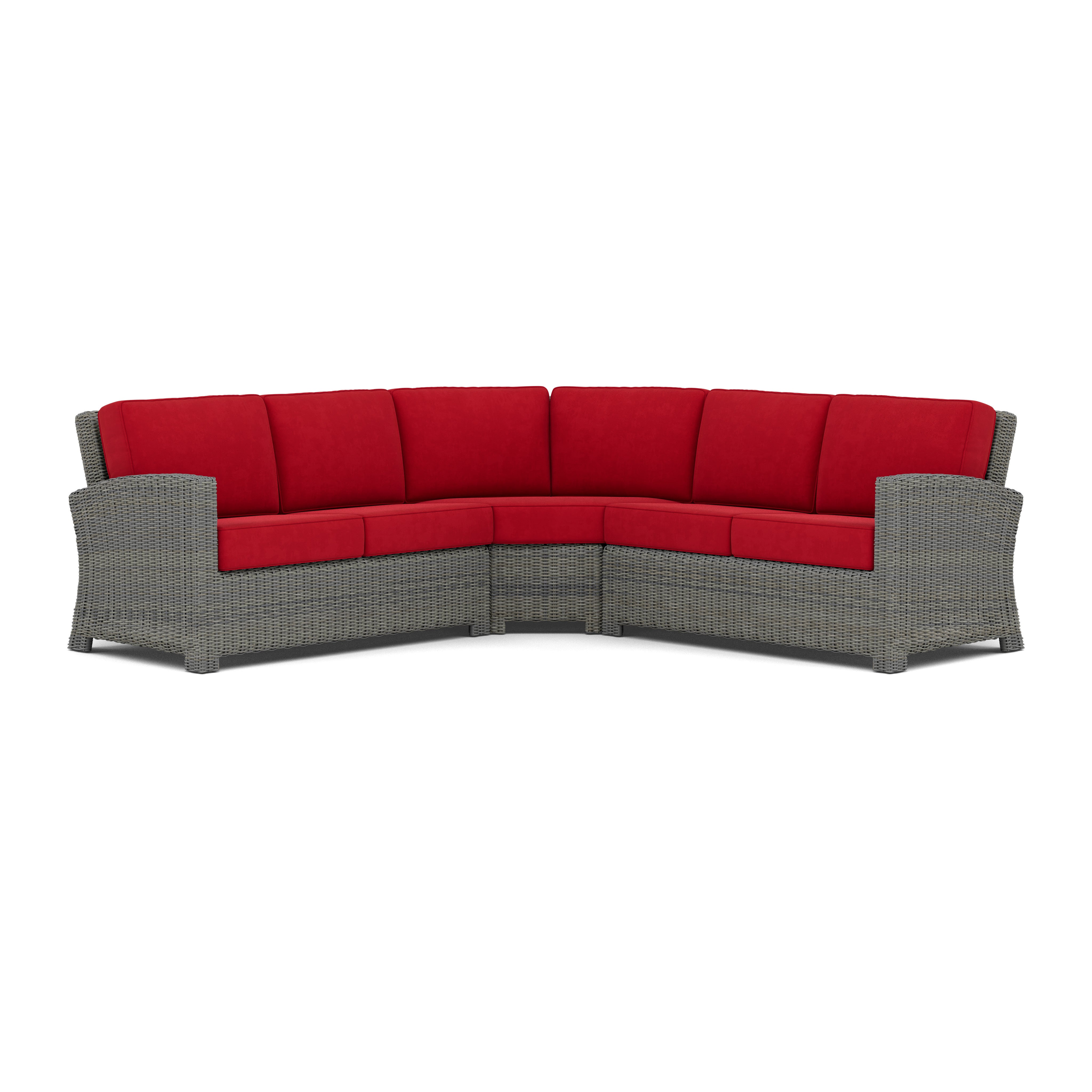 Gray wicker corner sectional with red cushions, viewed from the front.