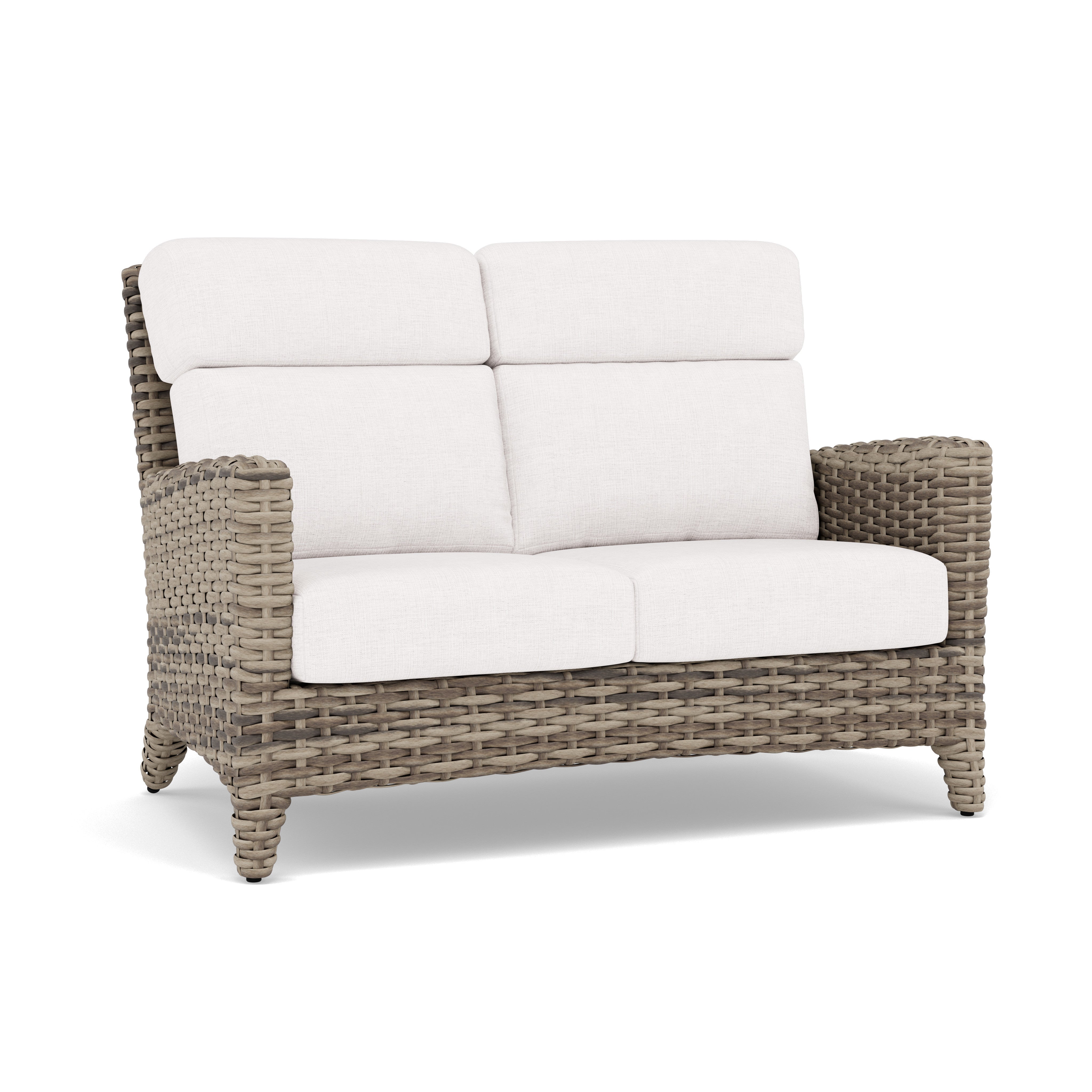 Woven rattan loveseat with light beige cushions, suitable for outdoor or indoor seating.