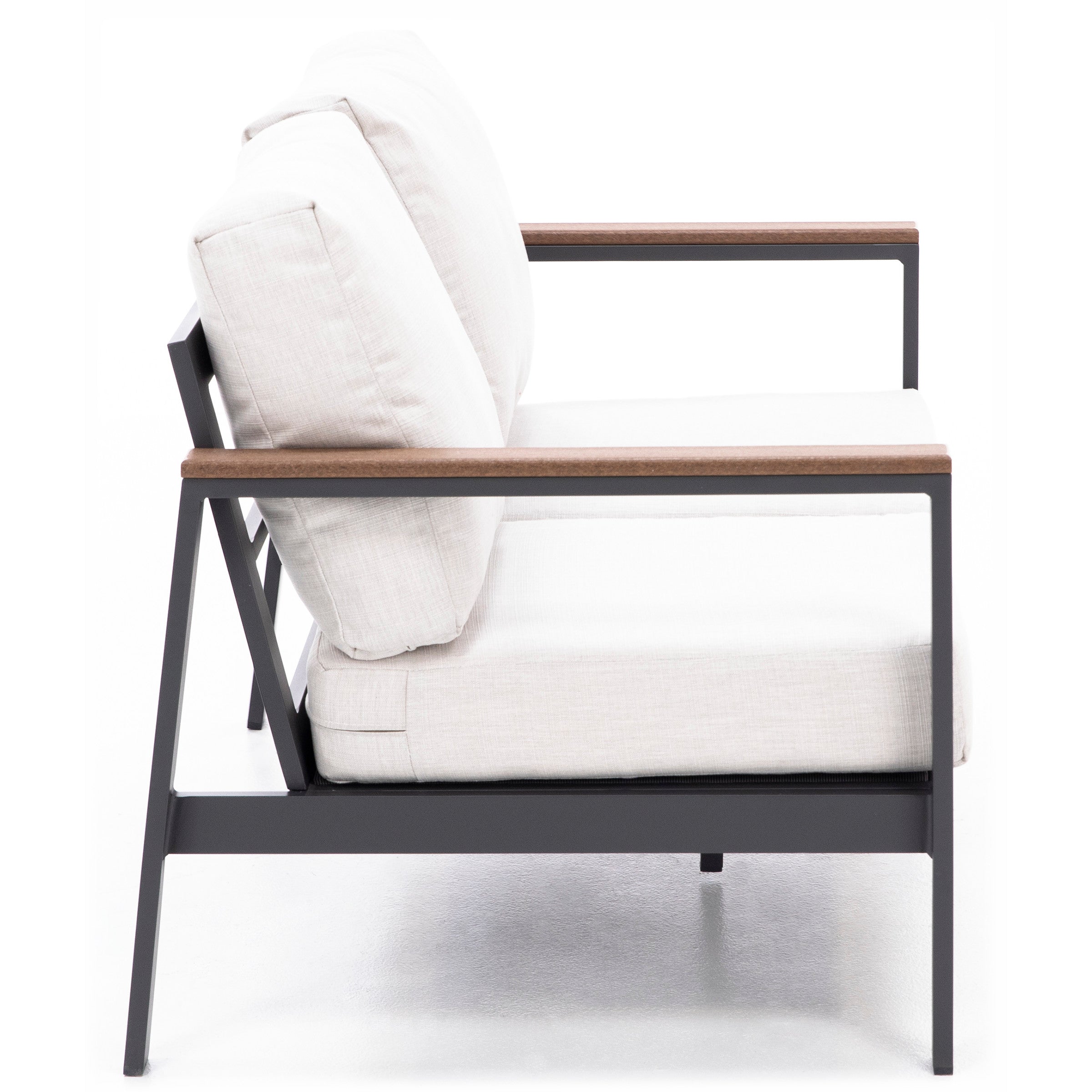 Side view of a modern lounge chair with light cushions and metal frame.