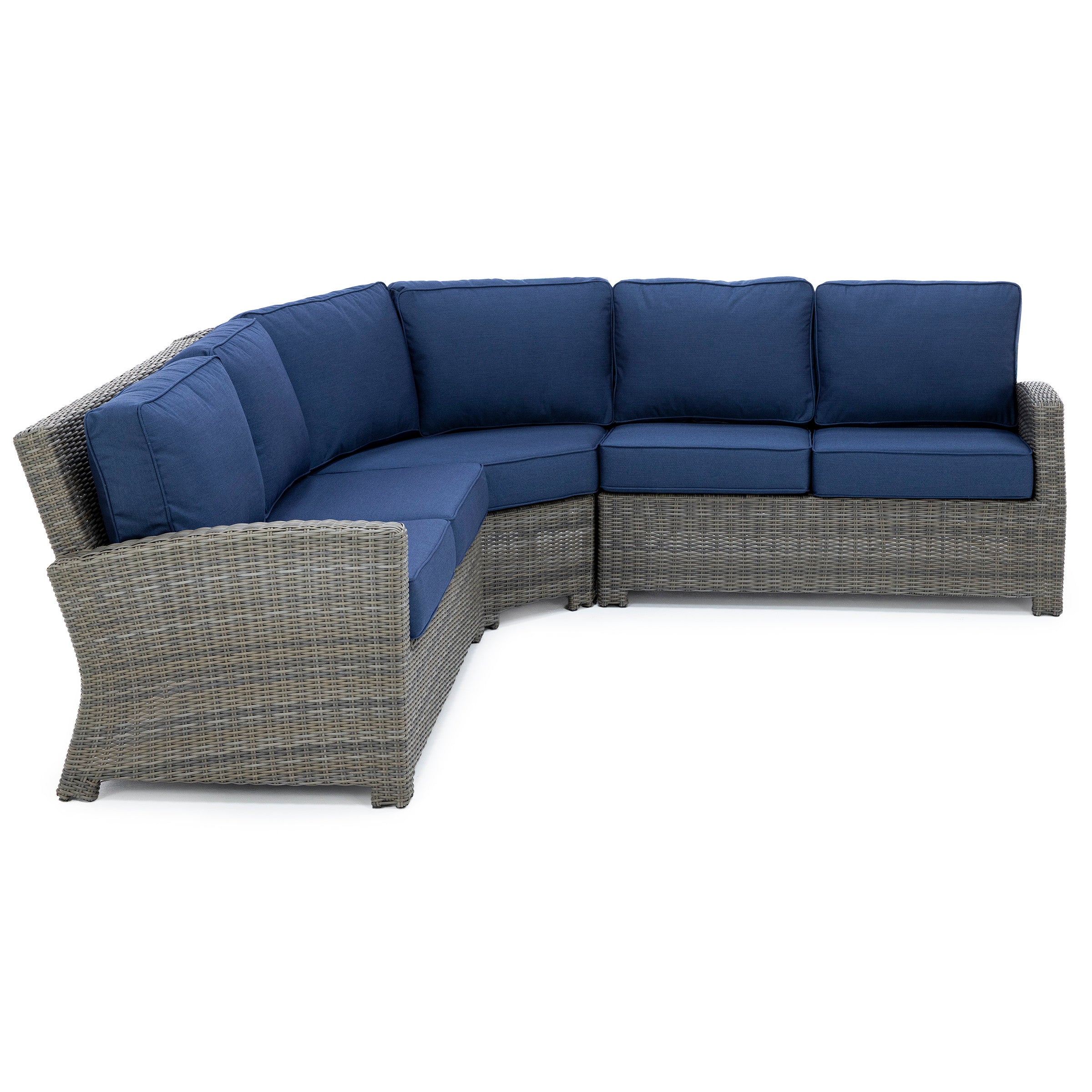 Curved outdoor sectional sofa with gray wicker frame and blue cushions.