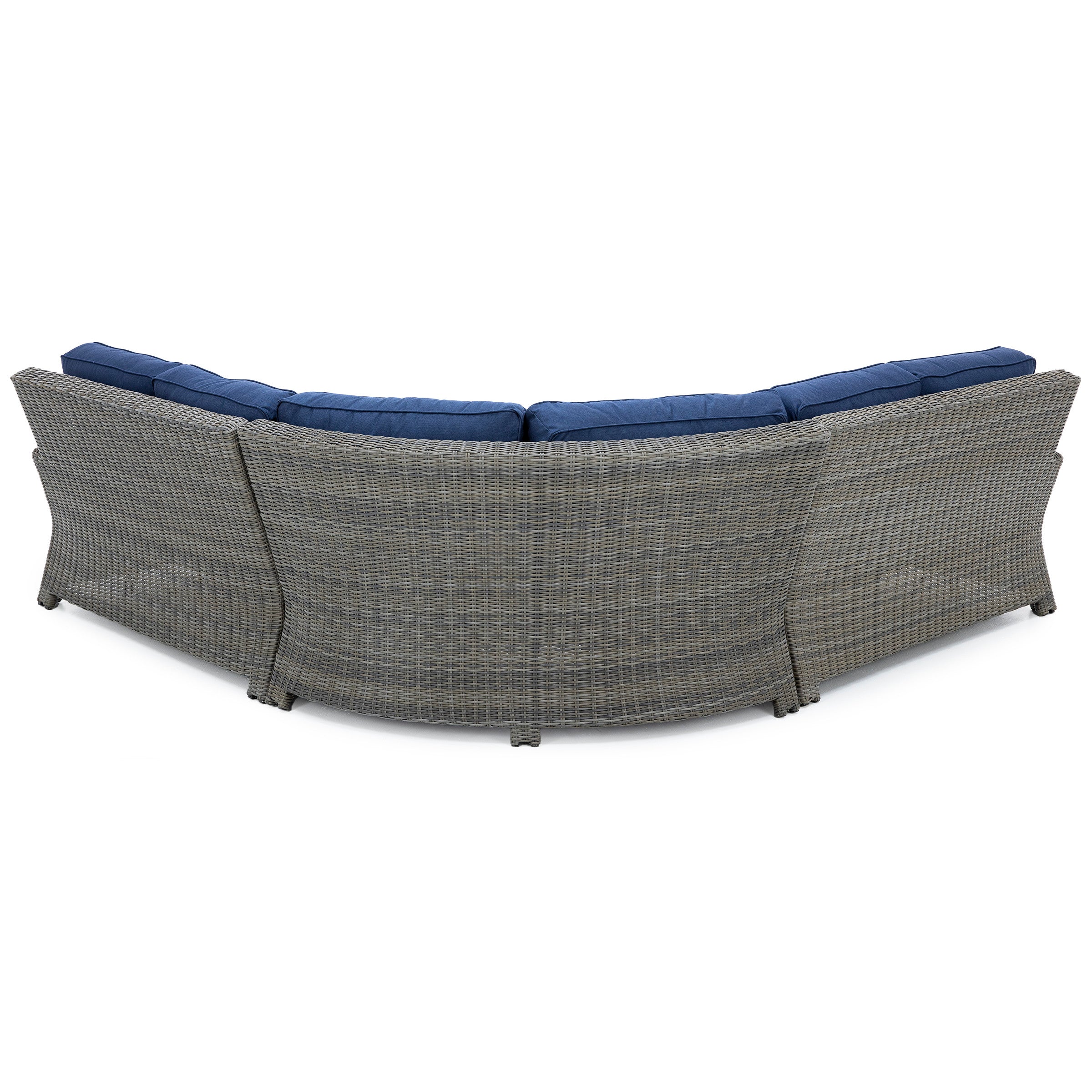 Back view of a curved outdoor wicker sofa with blue cushions.