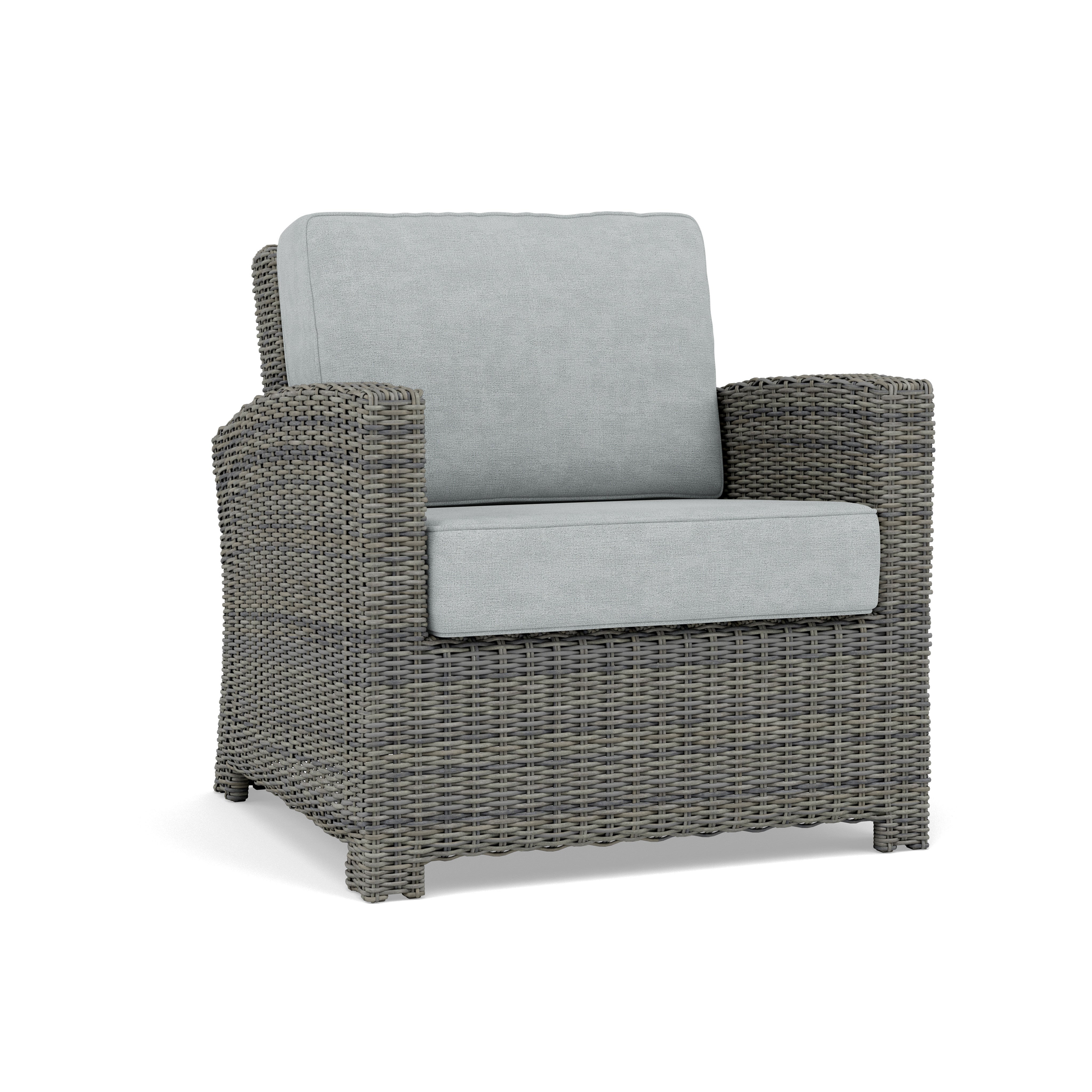 Gray wicker armchair with light gray cushions, suitable for outdoor or patio use.