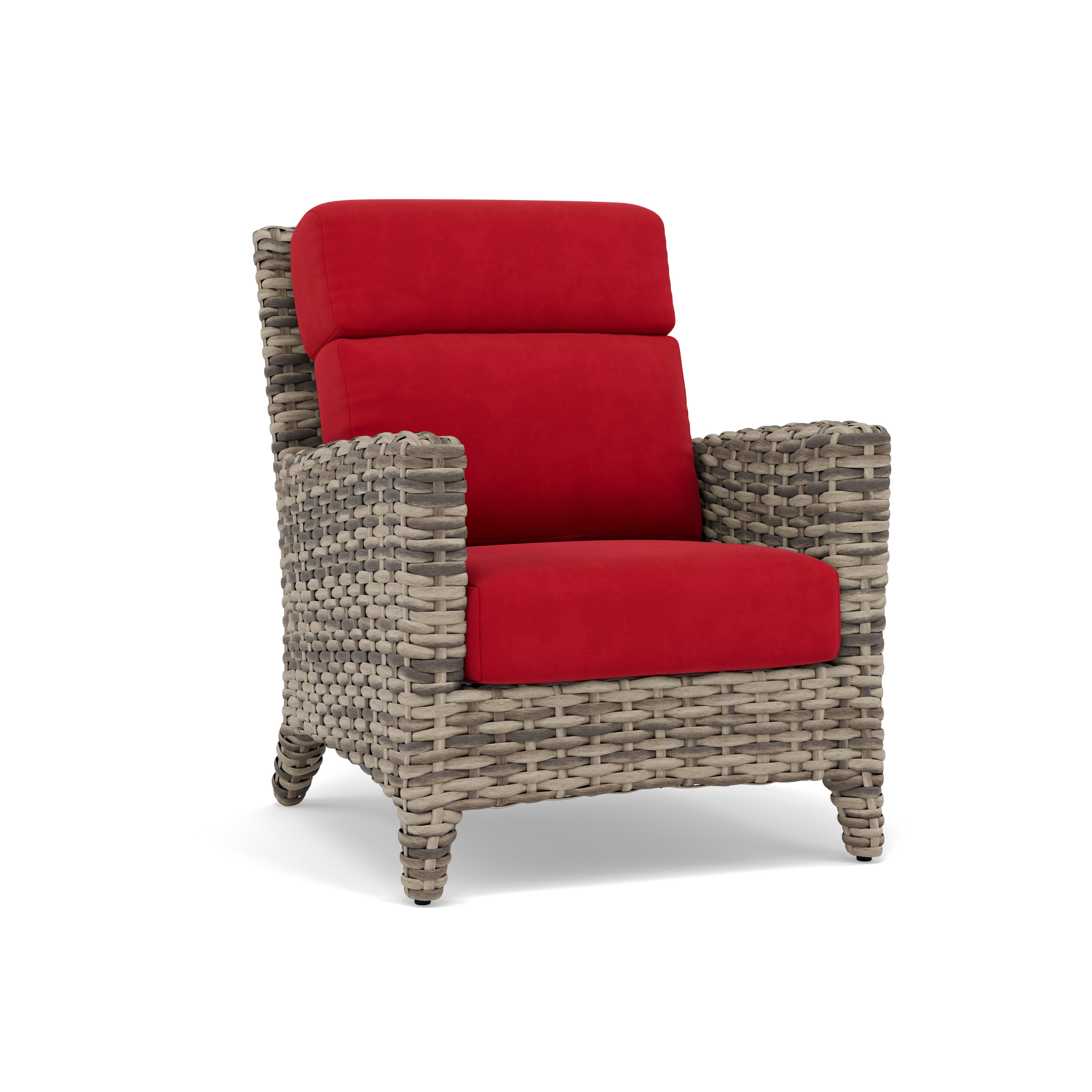 Woven wicker armchair with bold red cushions, shown against a white background.