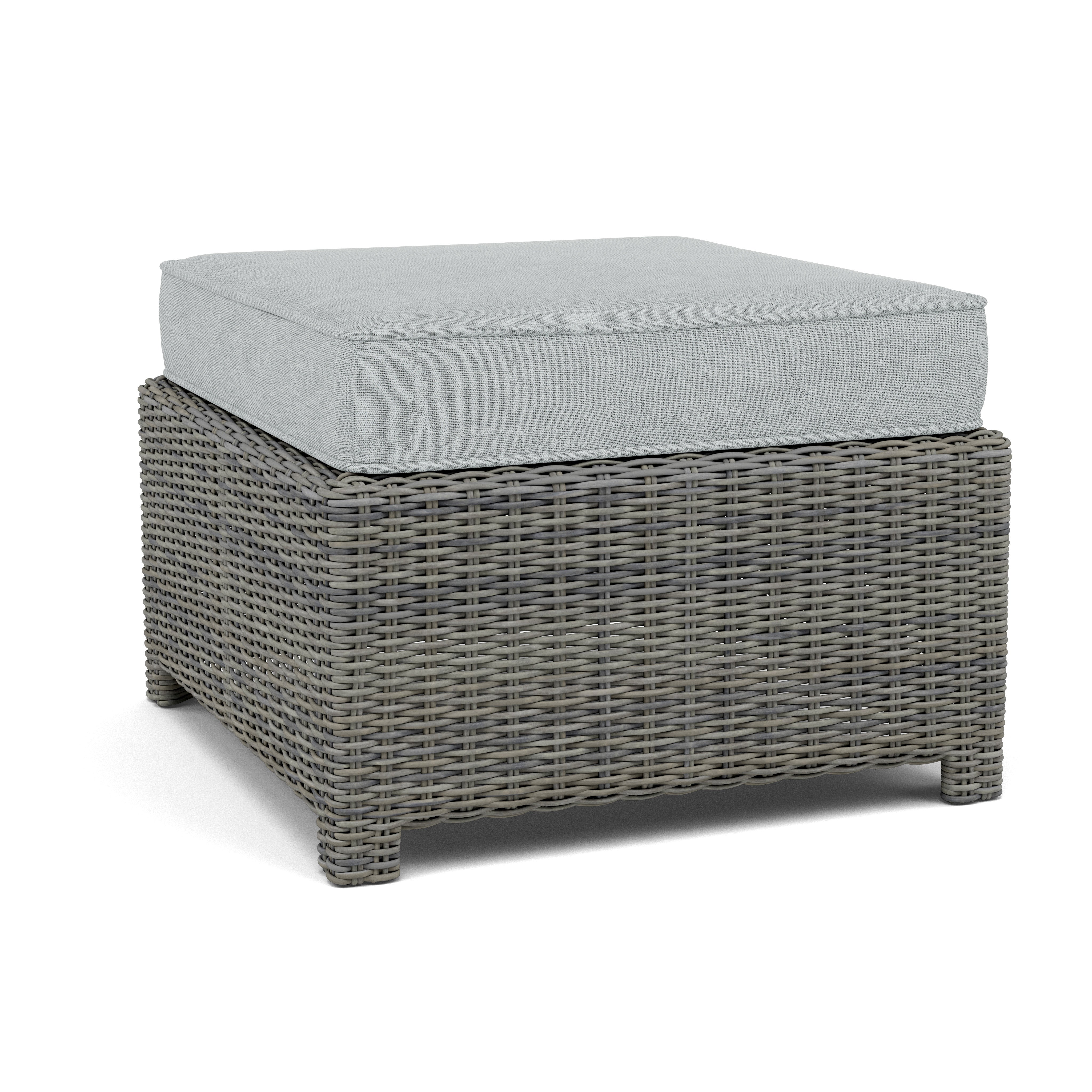 Square outdoor ottoman with gray wicker base and light gray cushion.