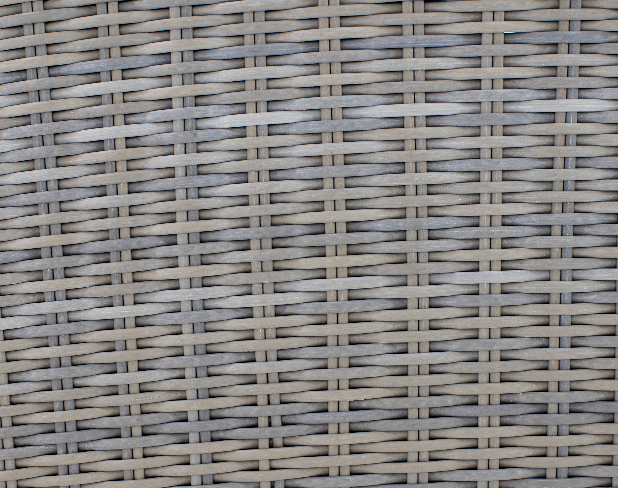 Close-up of gray and beige woven wicker texture.