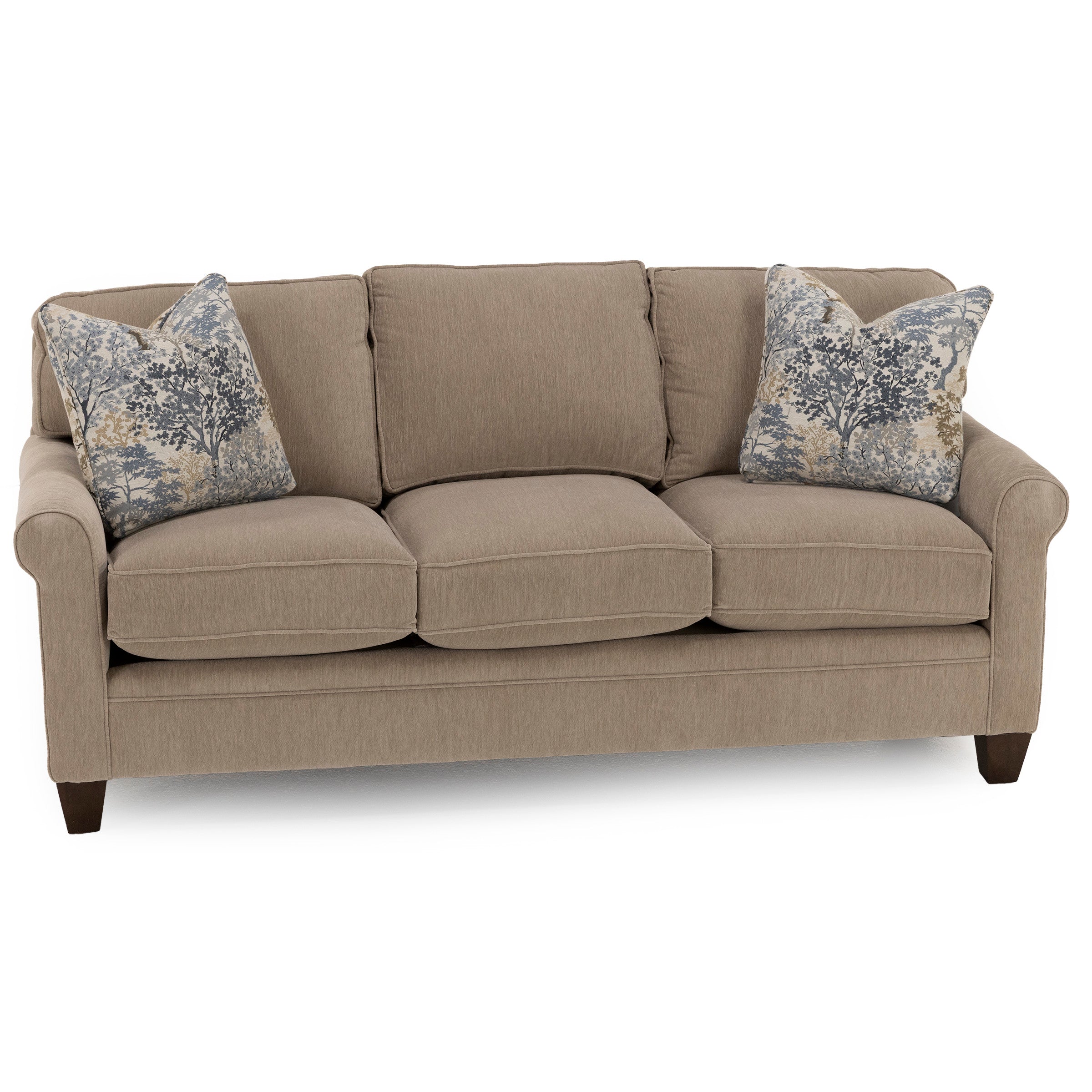 Beige fabric sofa with rolled arms and two patterned throw pillows.