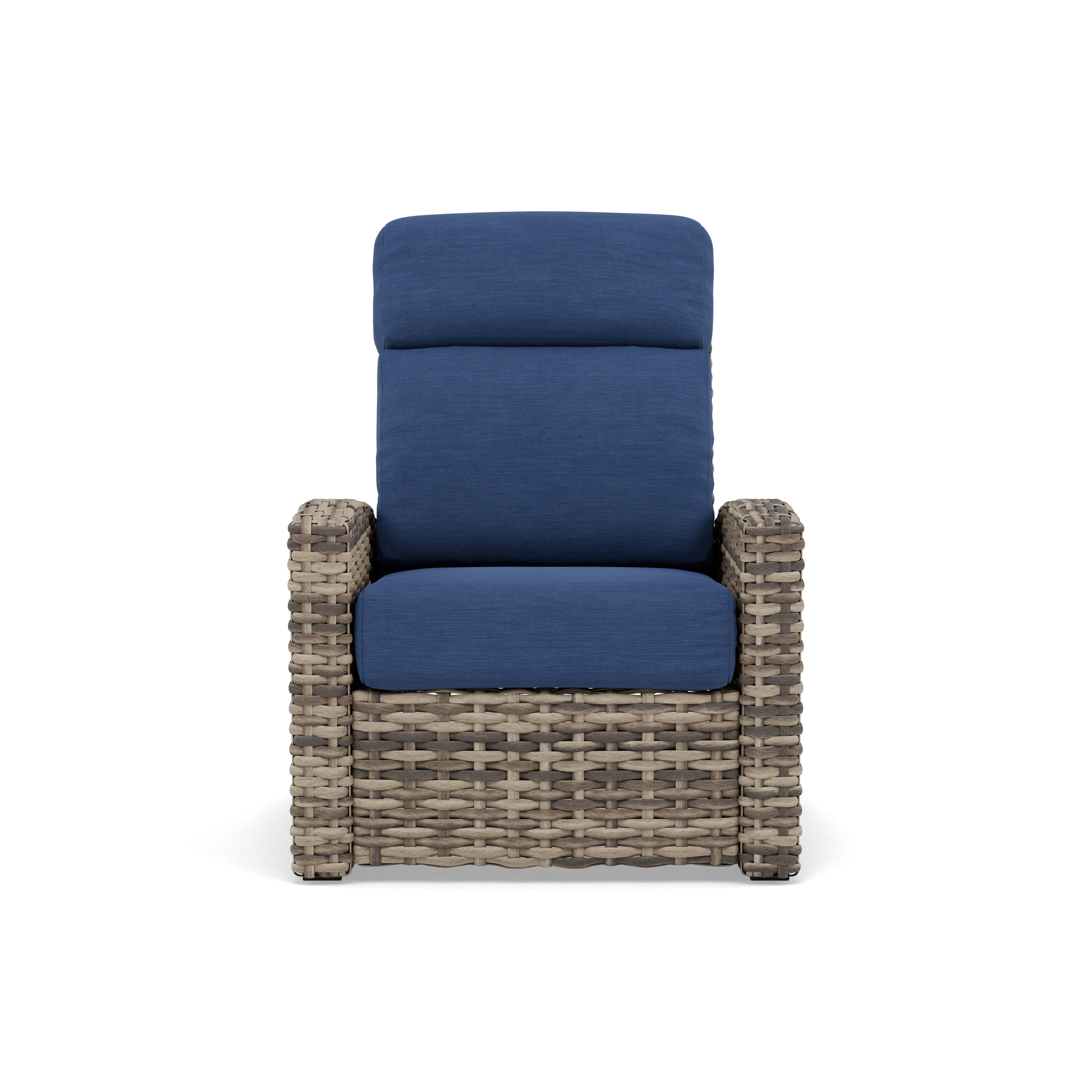 Wicker armchair with blue cushions, front view.