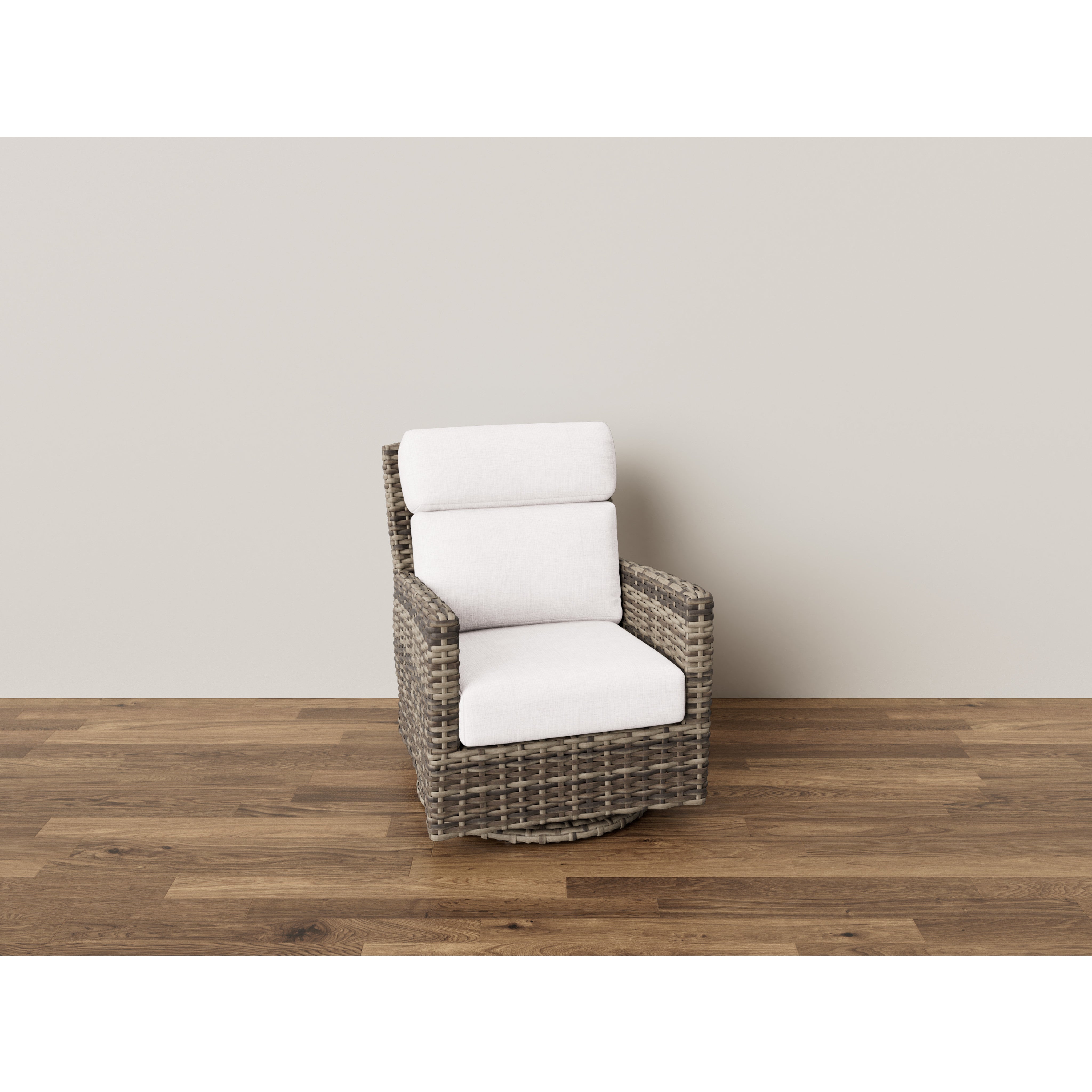 Woven outdoor swivel chair with white cushions on wood floor.