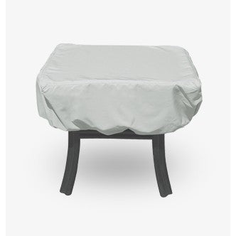 Patio ottoman with a fitted weatherproof cover.