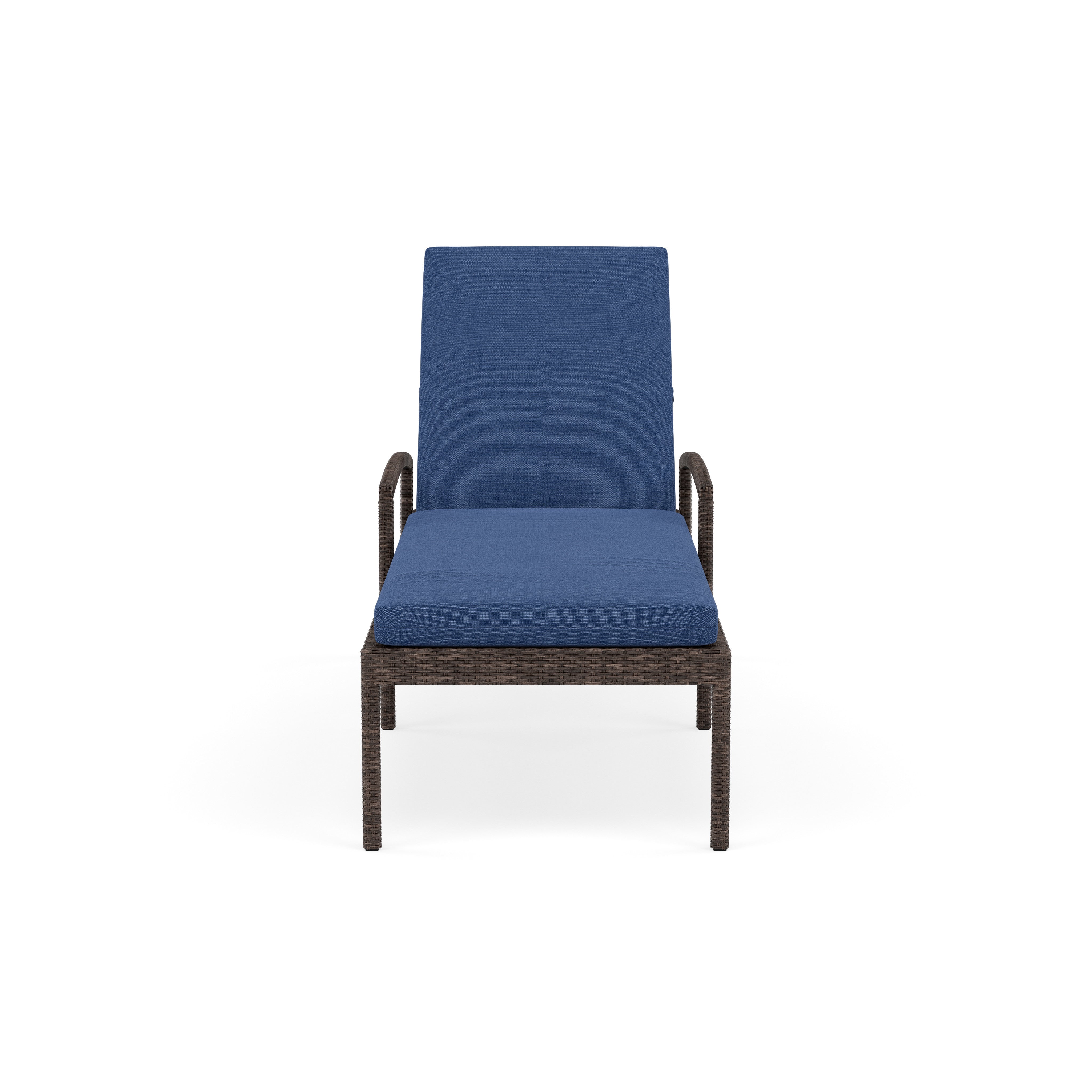 Front view of a brown wicker lounge chair with blue cushions.