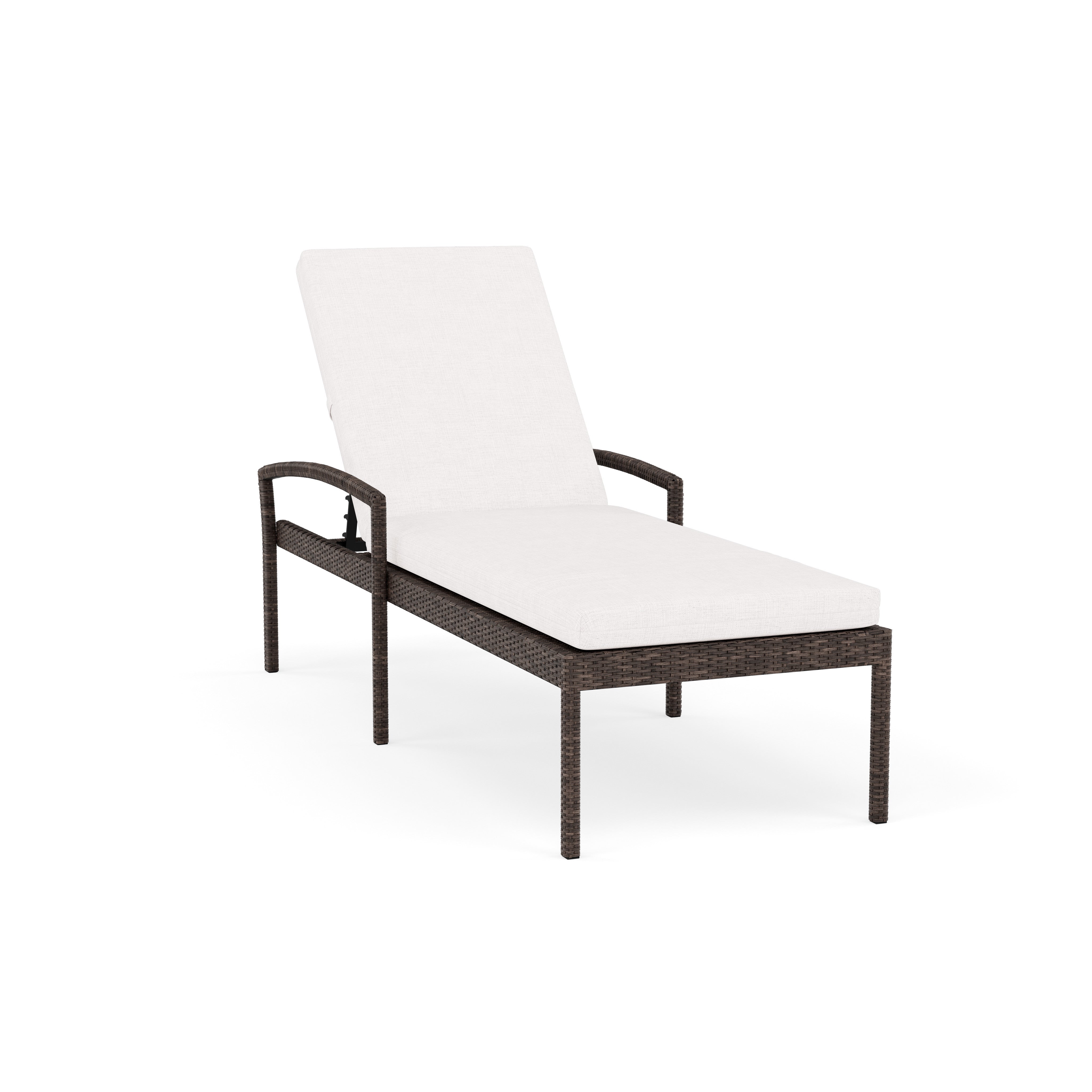 Outdoor chaise lounge with a white cushion and wicker frame.