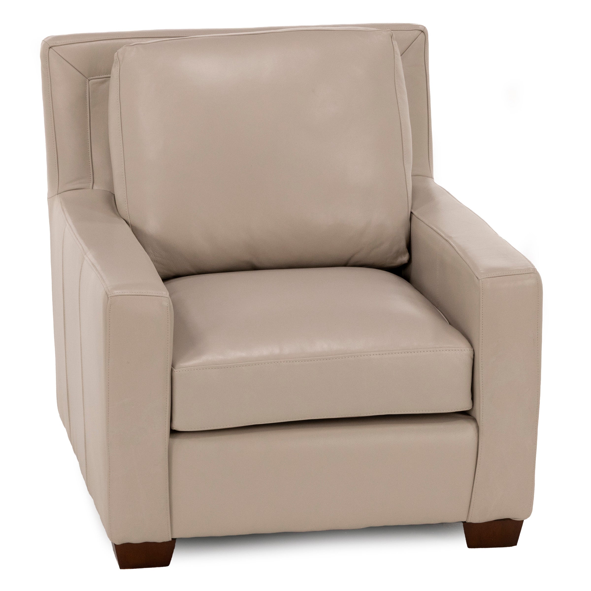 Beige leather armchair with square arms and wooden legs.