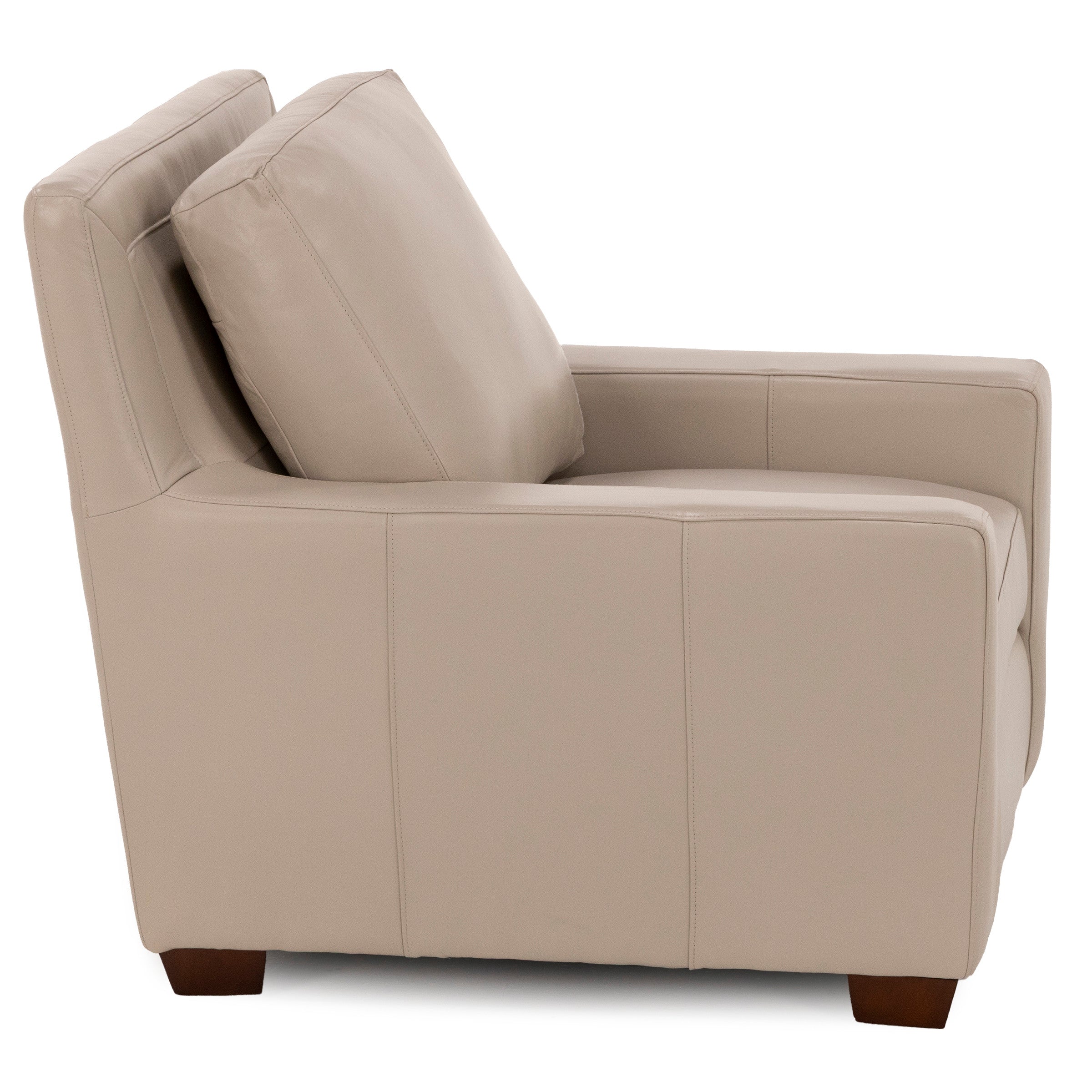 Beige leather armchair shown from side view with wooden legs.