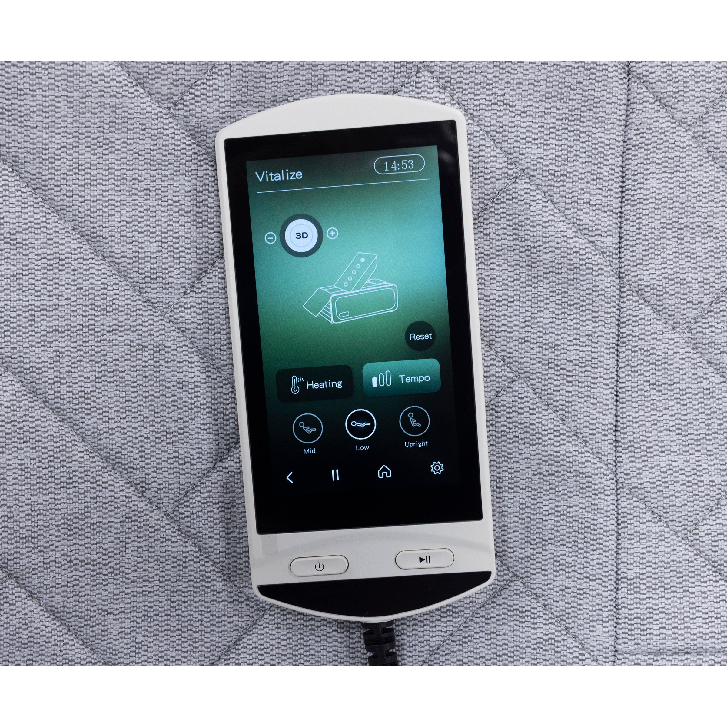 Touchscreen remote displaying adjustable bed settings on a quilted surface.