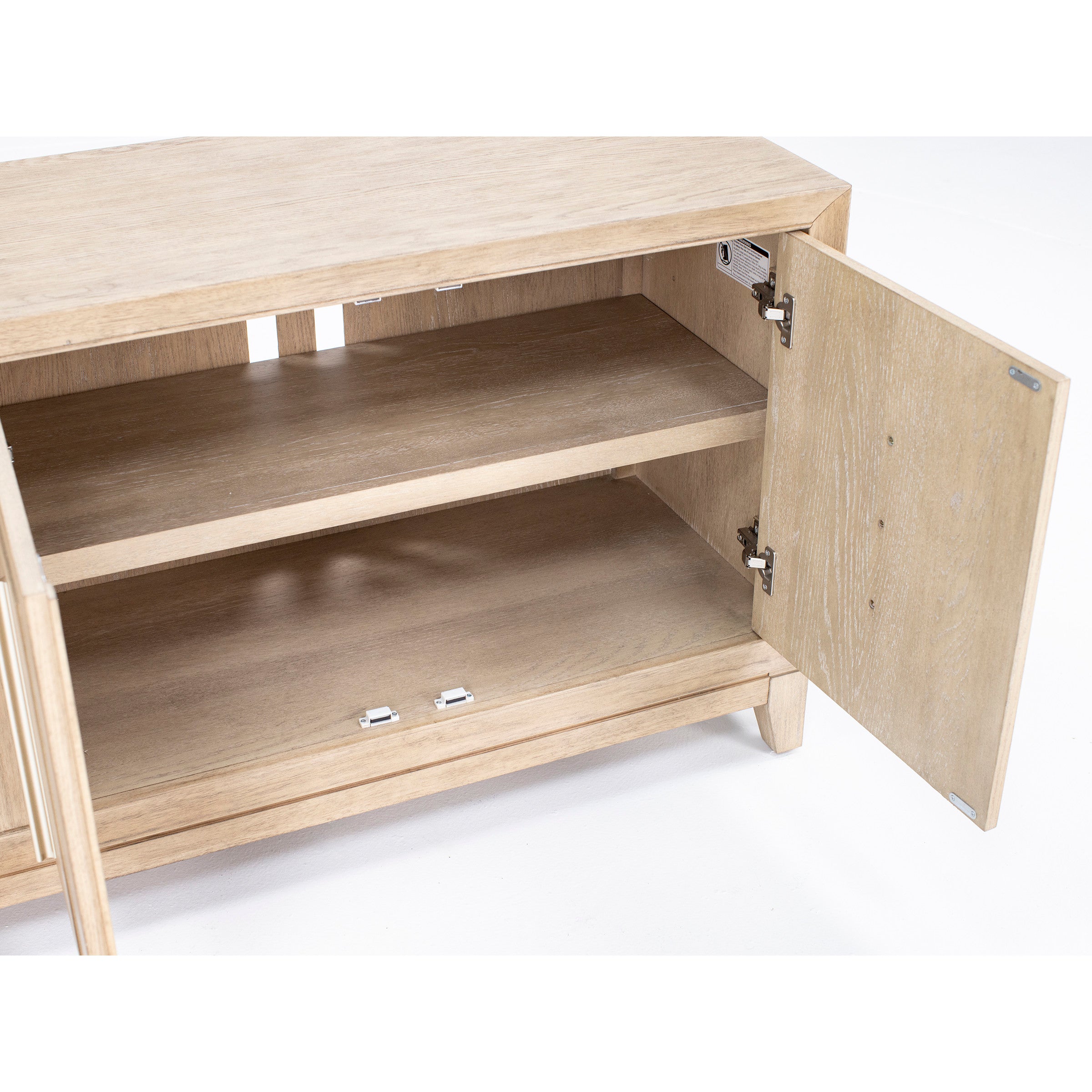Light wood cabinet shown open with two shelves for storage.