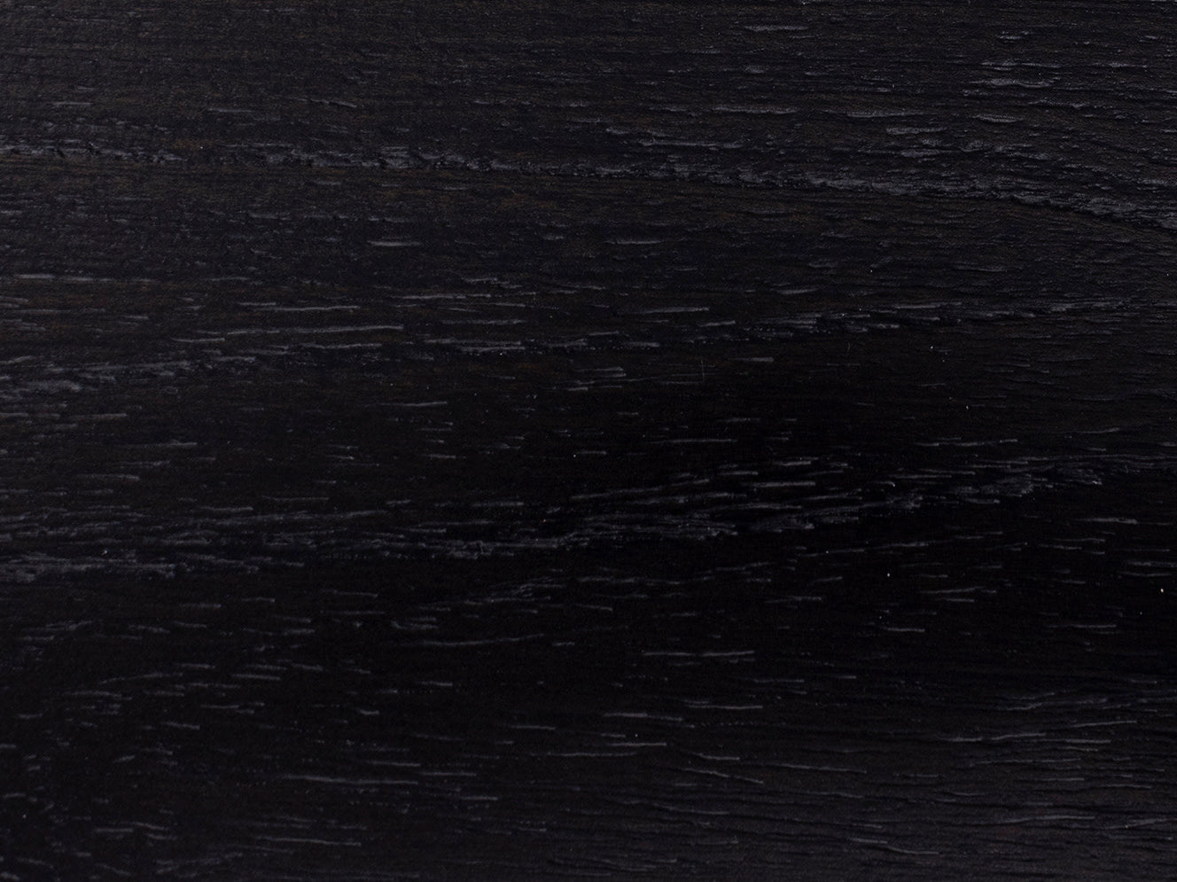 Dark wood grain texture, commonly used as a surface or material sample.