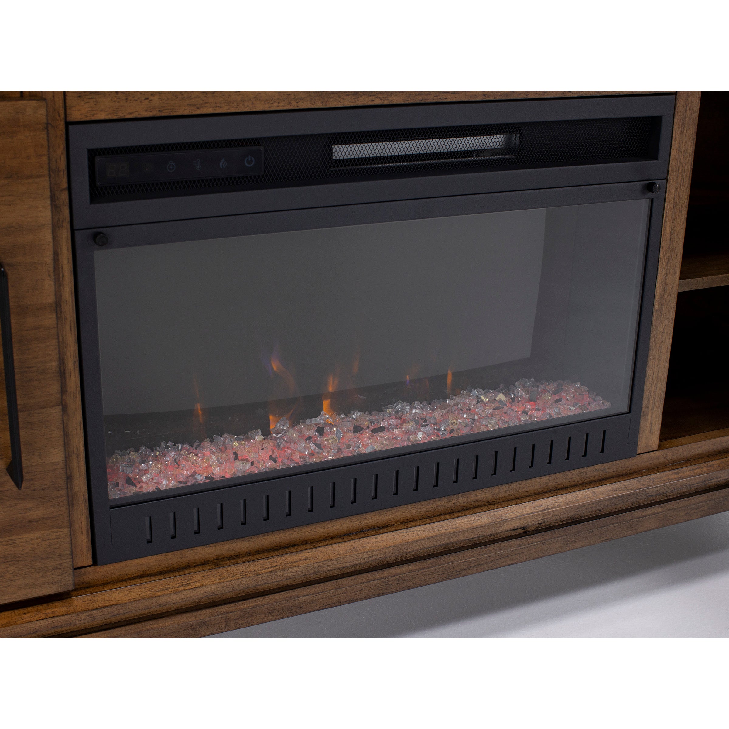 Electric fireplace with glowing faux embers set in wooden cabinet.