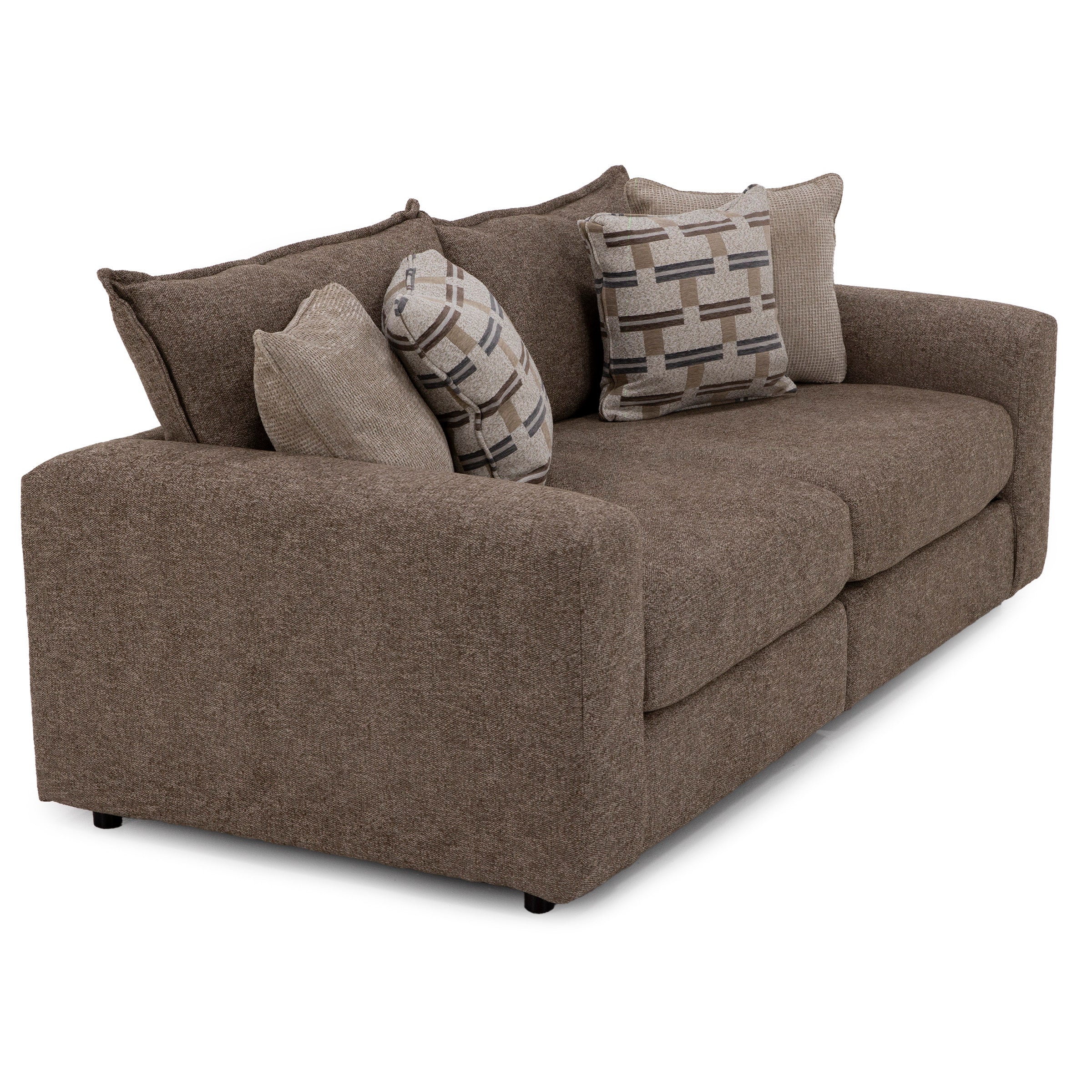 Brown fabric sofa with four cushions, including two with geometric patterns.