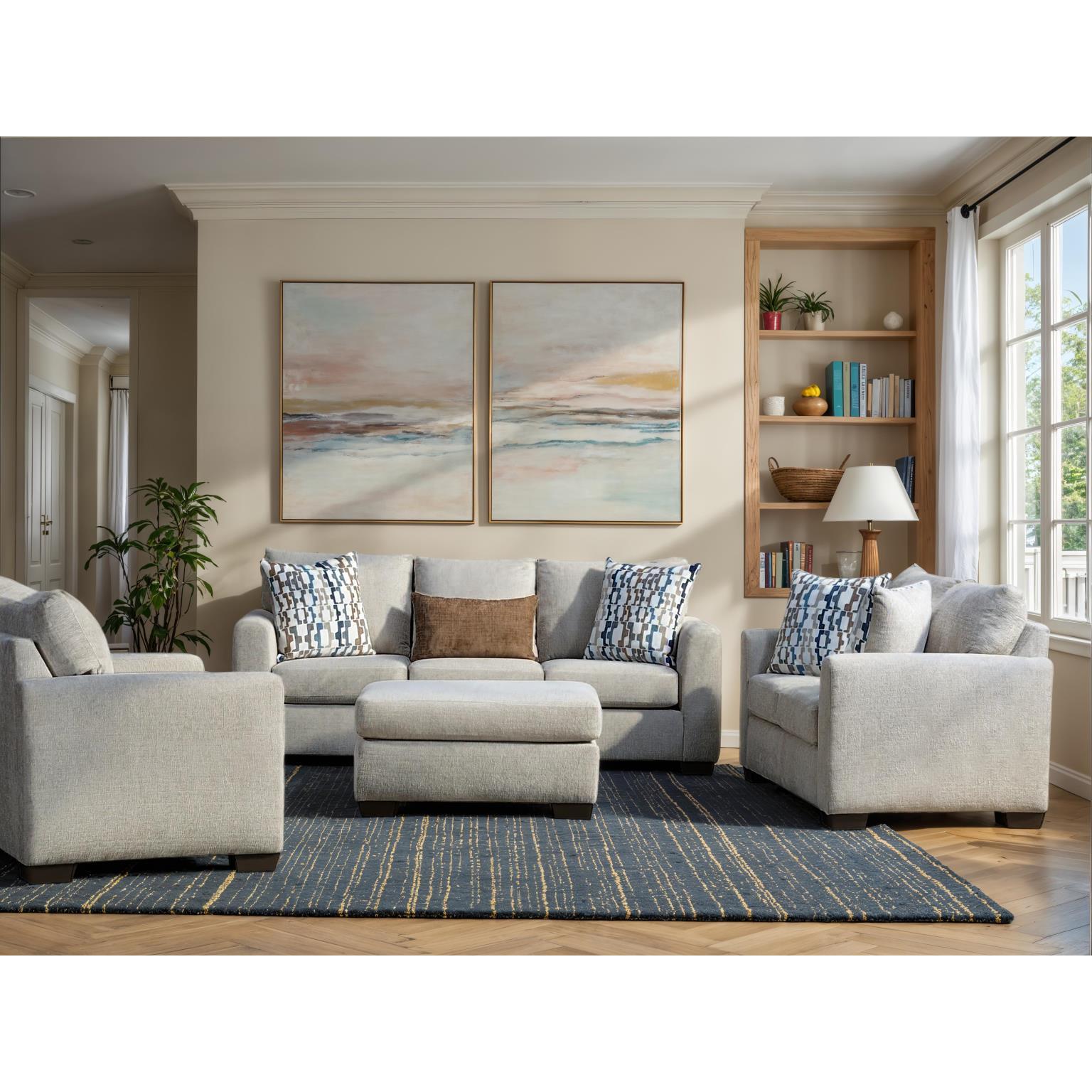 Modern living room with light gray sofas, blue patterned pillows, and large abstract art.