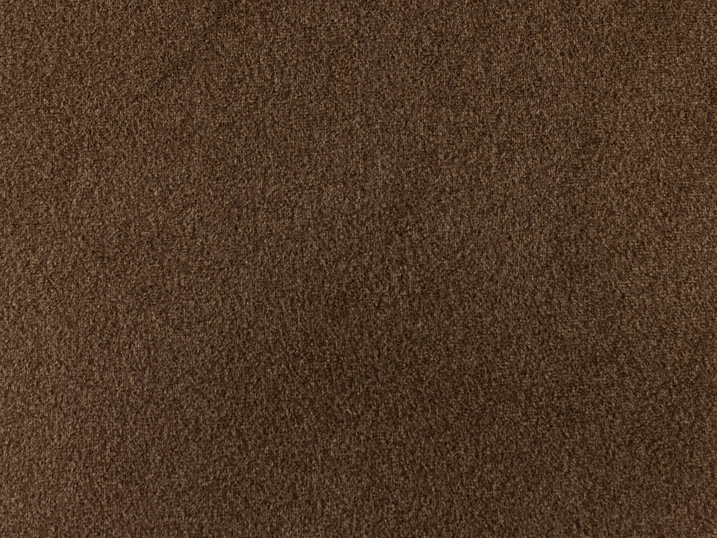 Close-up of brown textured fabric or carpet surface