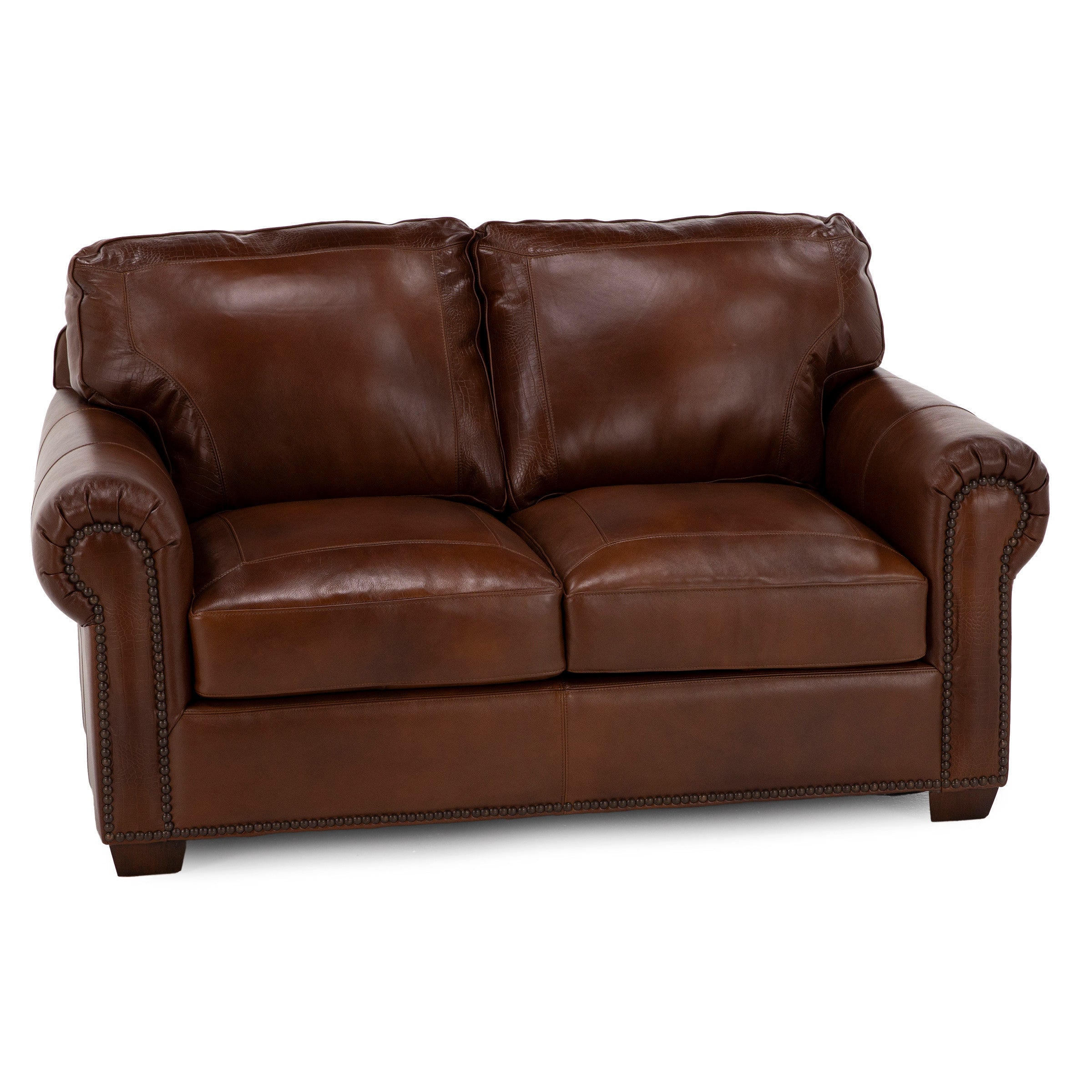 Brown leather loveseat with rolled arms and nailhead trim.