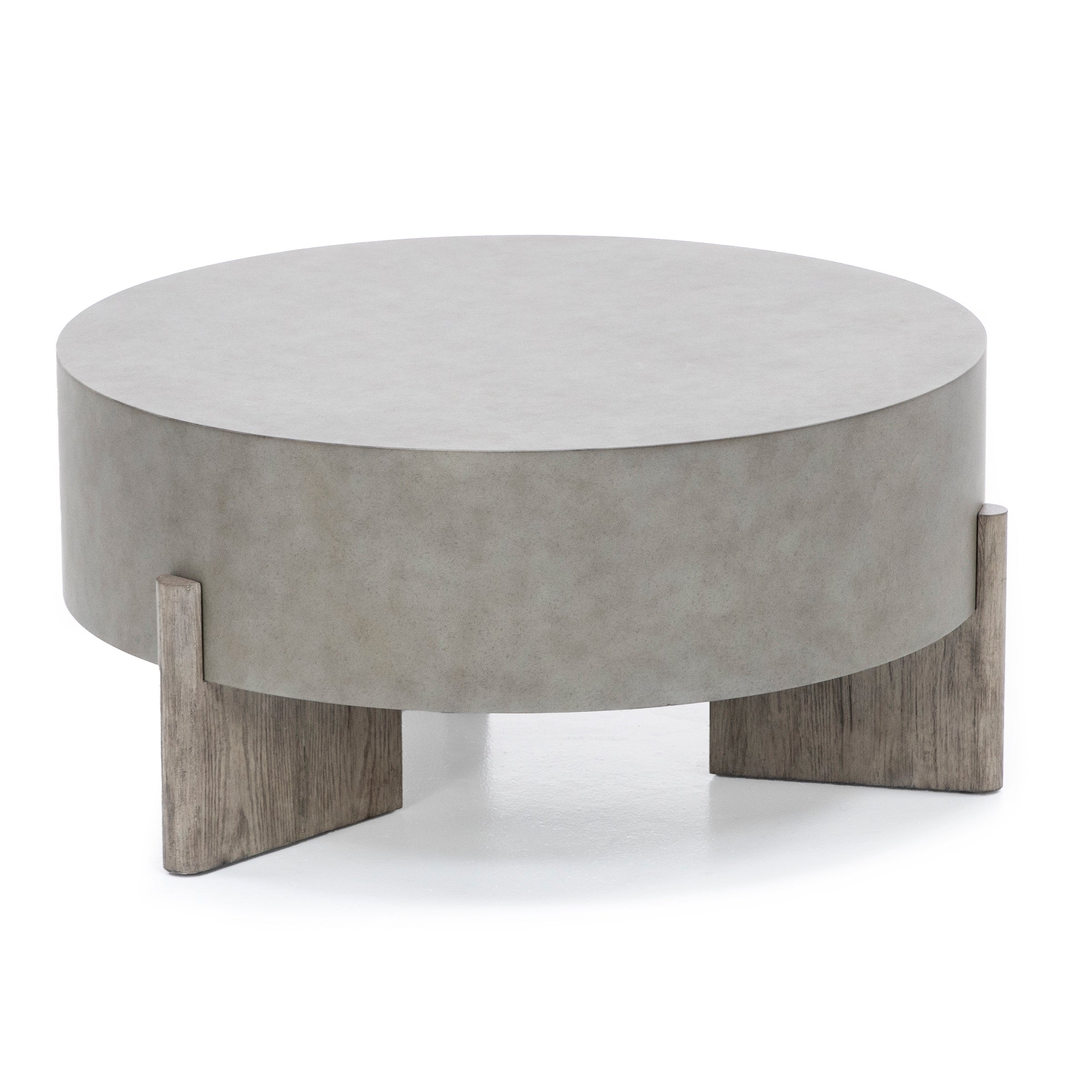 Round, modern coffee table with gray finish and wood legs.