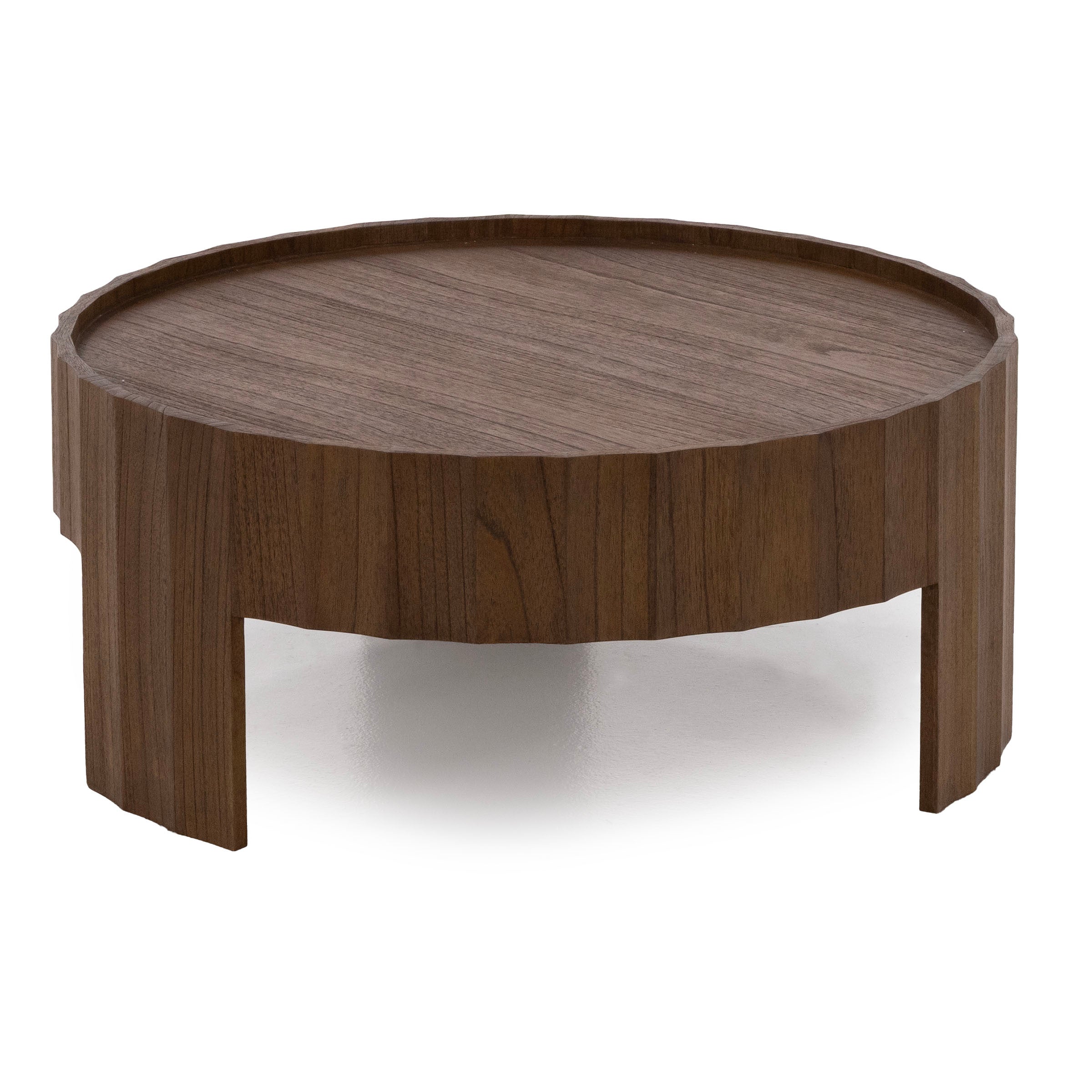 Round wooden coffee table with carved edge detail and a low profile.