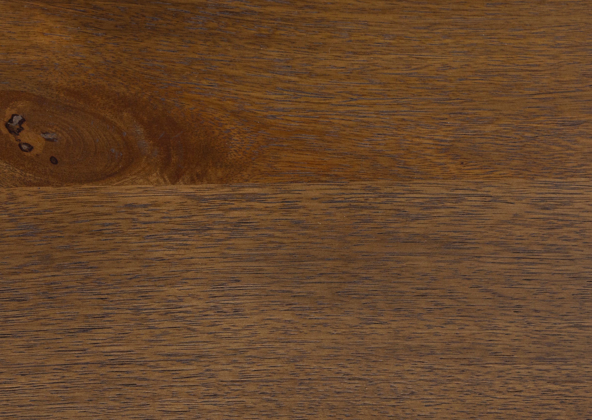 Close-up of natural brown wood grain texture.