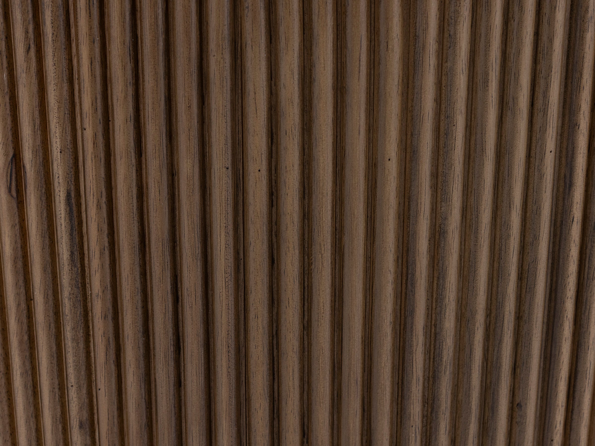 Close-up of vertical grooved wood texture.