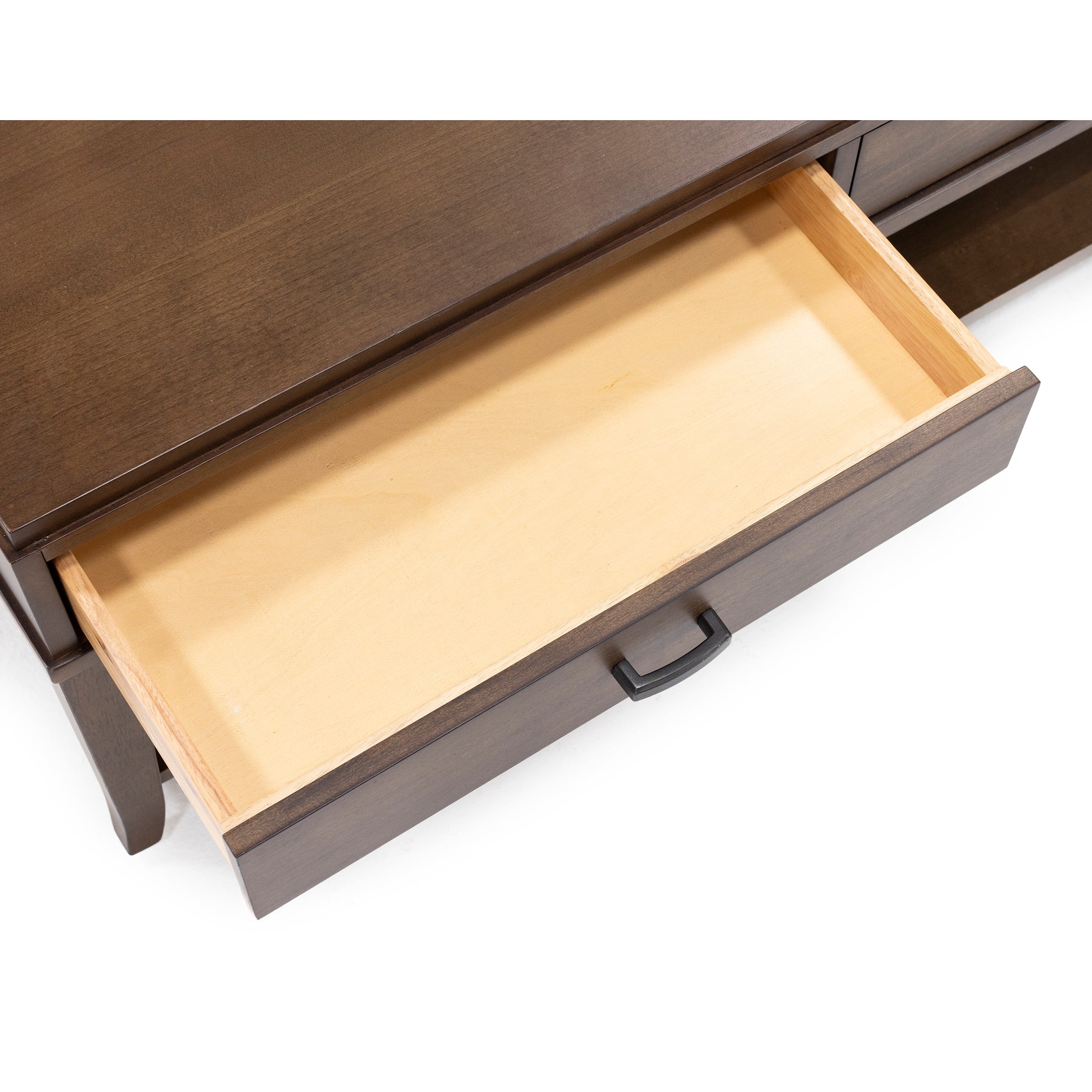 Open wooden drawer with a dark finish, shown from above.