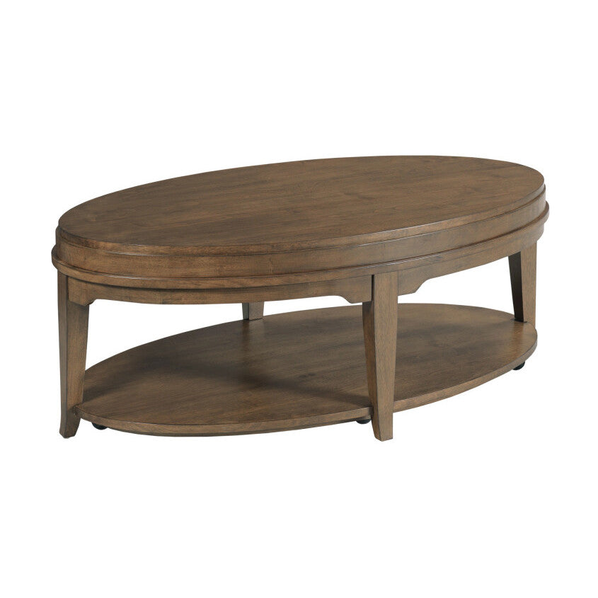 Oval wooden coffee table with lower storage shelf.