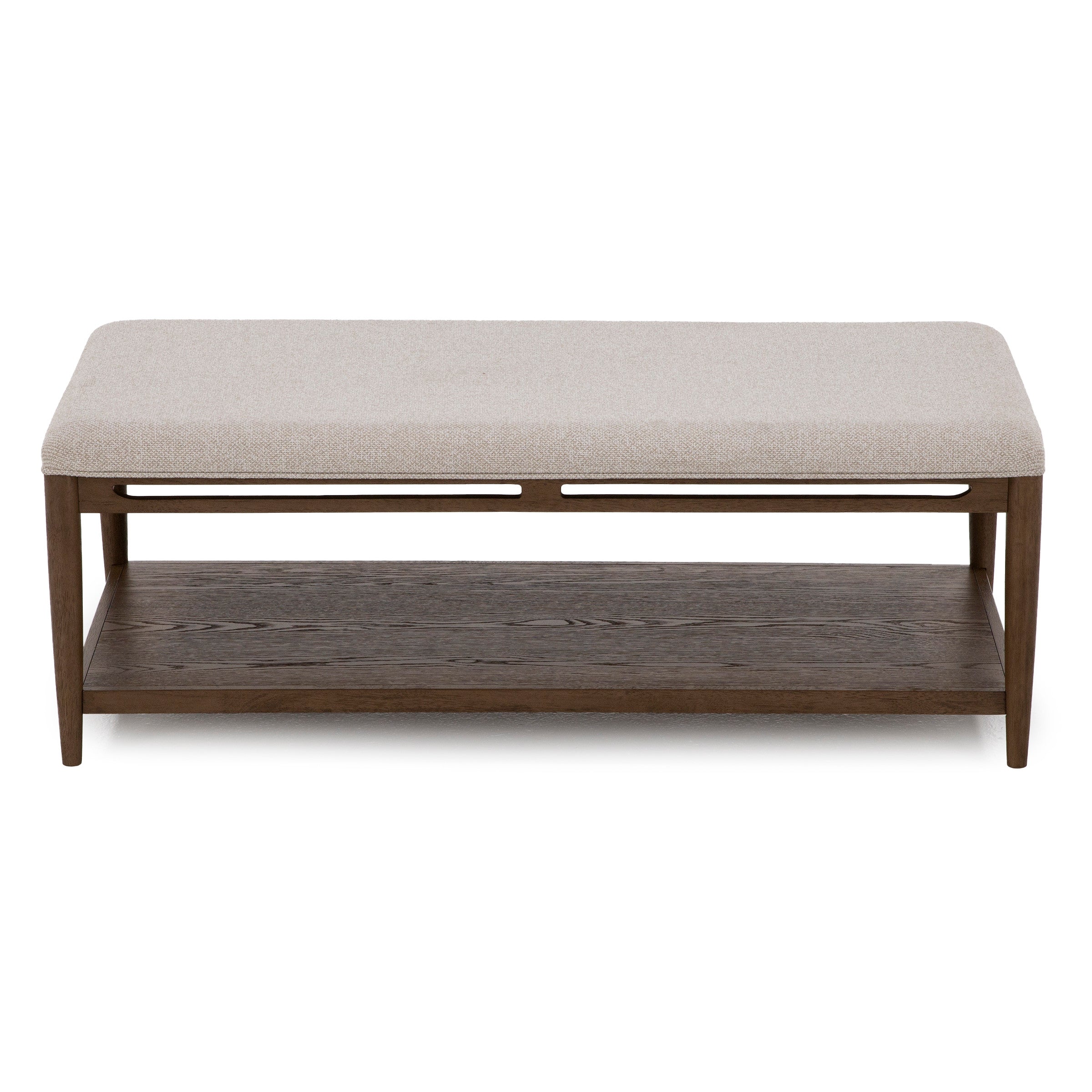 Rectangular bench with light upholstered cushion and wooden frame, featuring a lower storage shelf.