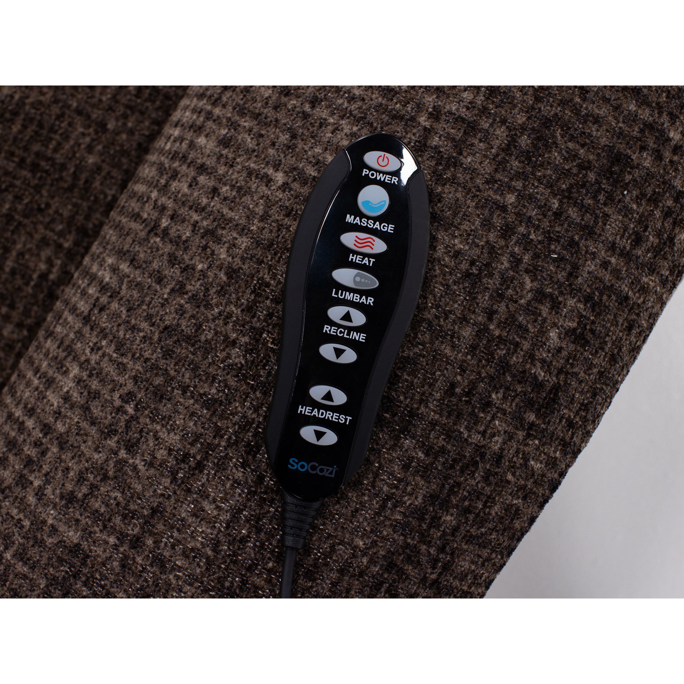 Remote control for recliner chair with massage, heat, and adjustable settings, on brown fabric.