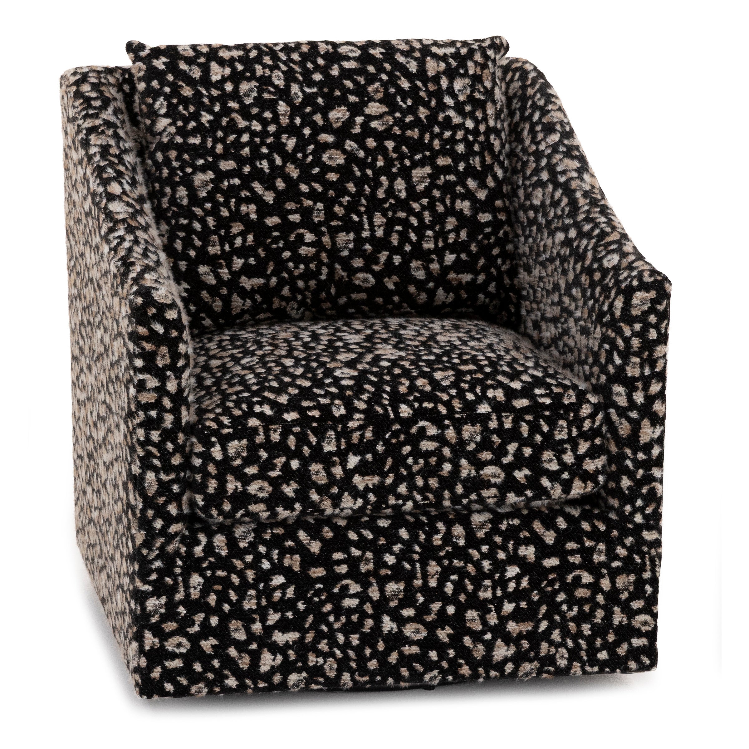 Modern accent chair with black and beige abstract pattern upholstery.