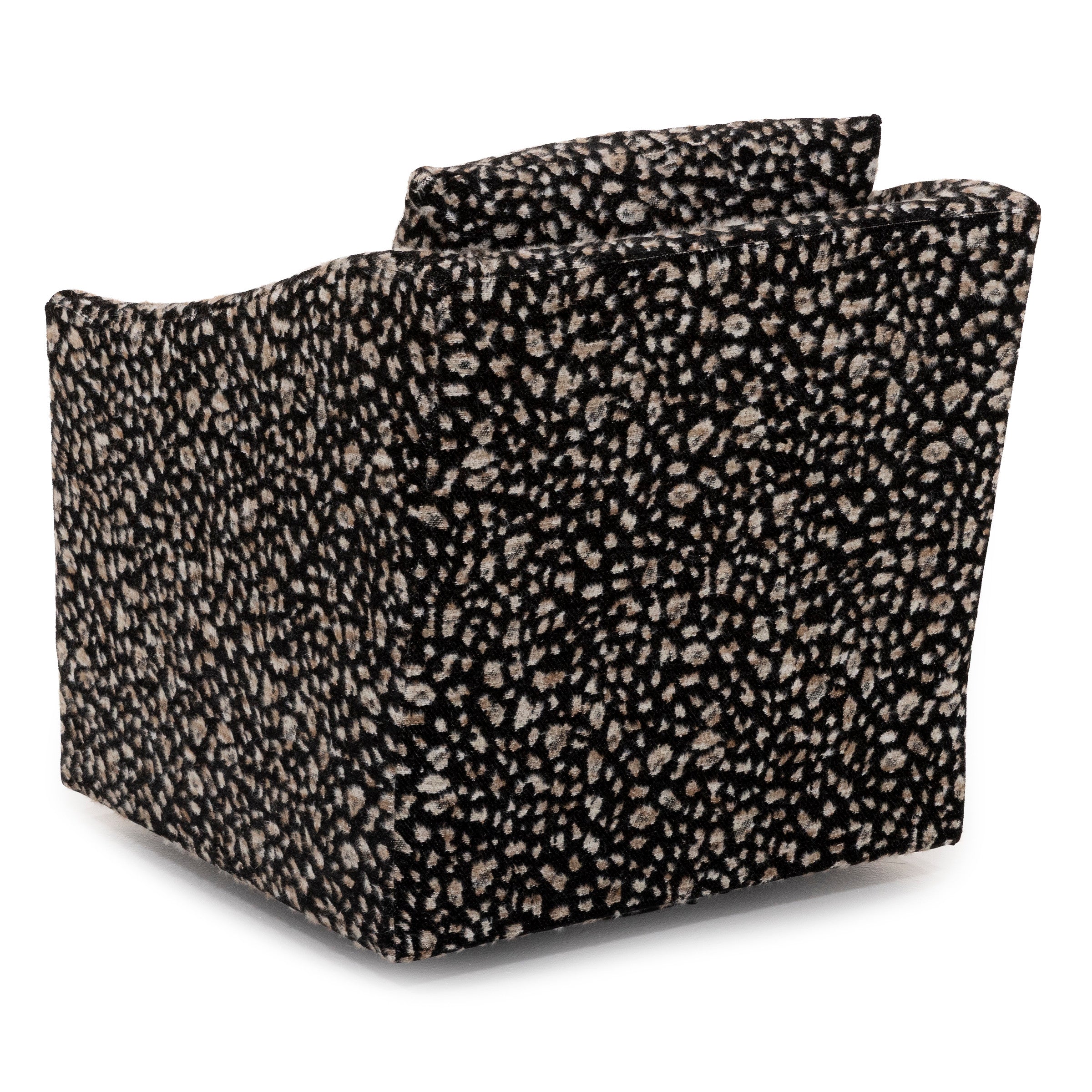 Back view of a black accent chair with a tan and white animal print pattern.