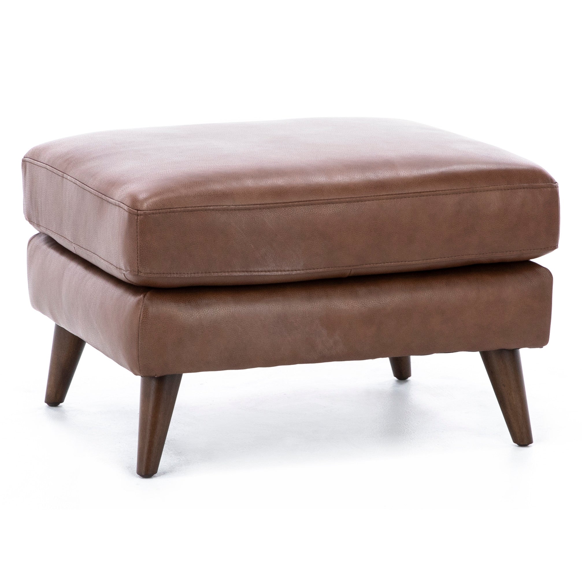 Brown leather ottoman with tapered wooden legs.