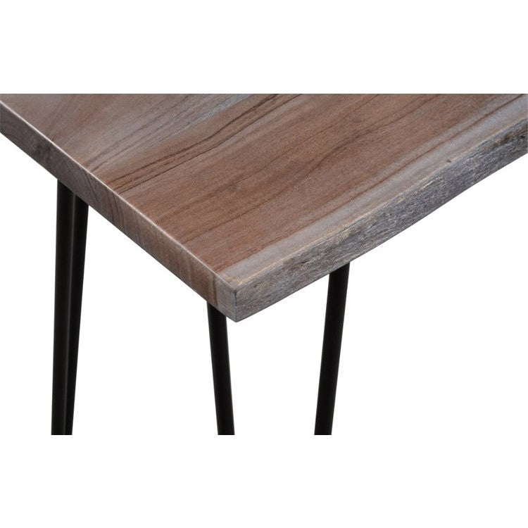 Close-up of a wood tabletop with black metal legs.